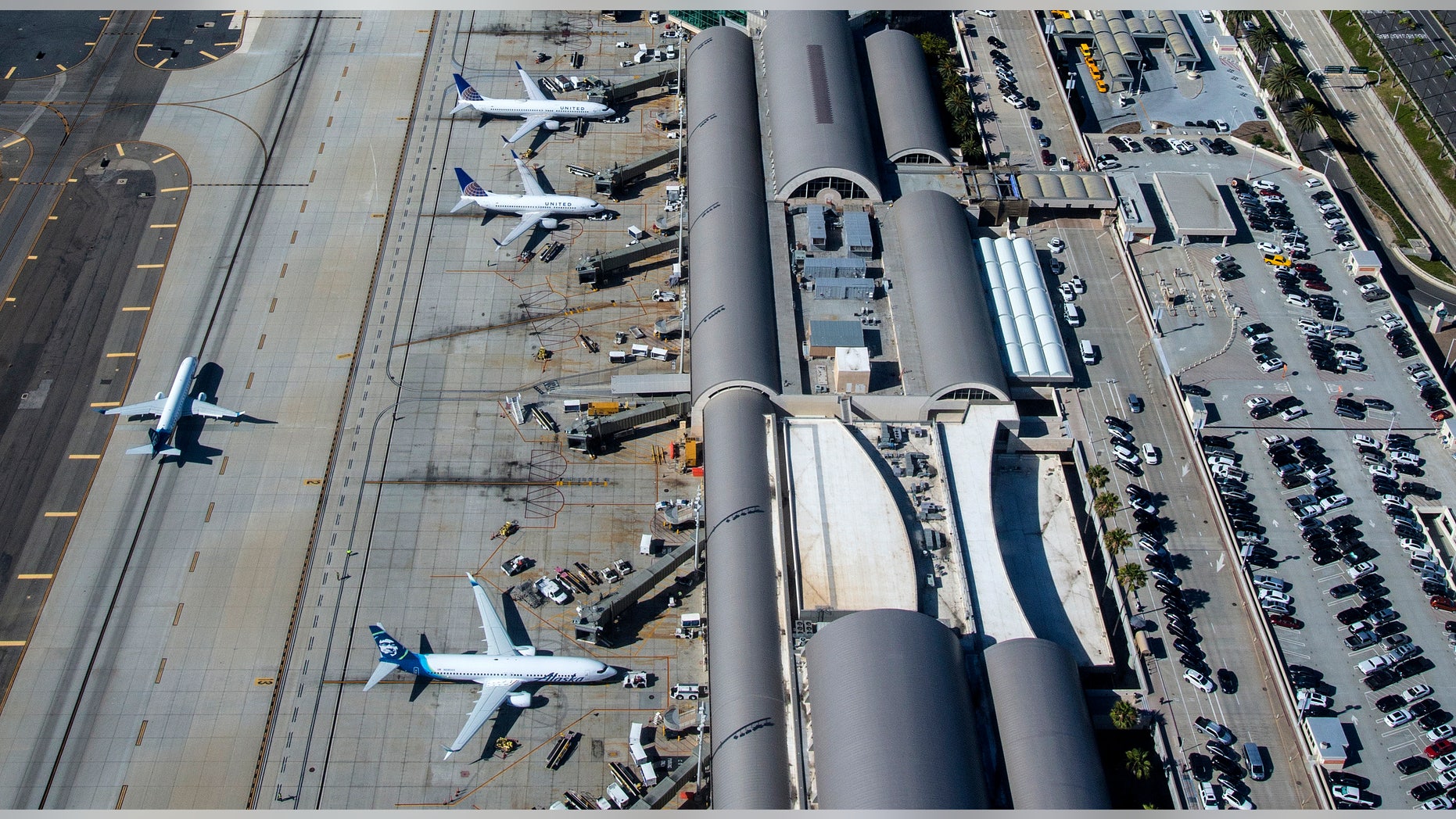 An airport contractor was killed after the explosion of a tire in a John Wayne airport workshop.