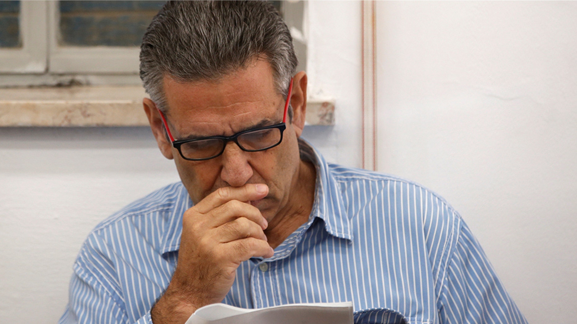 Gonen Segev, a former Israeli minister convicted of spying for Iran, is seen in court in Jerusalem in 2018.