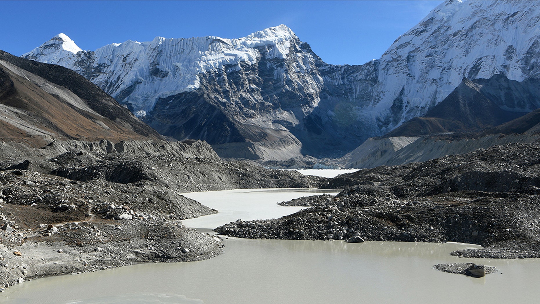 This picture taken on November 22, 2018 shows a general view of the Imja glacial lake controlled exit channel in the Everest region of the Solukhumbu district, some 140km northeast of Kathmandu. - Formed in the shadow of Mount Everest, the turquoise depths of Nepal's Imja glacial lake would be a breathtaking miracle of nature to behold -- were they not a portent of catastrophic floods. (Photo by Prakash MATHEMA / AFP) / TO GO WITH Climate-energy-UN-COP24-Nepal, FOCUS by Paavan MATHEMA (Photo credit should read PRAKASH MATHEMA/AFP/Getty Images)