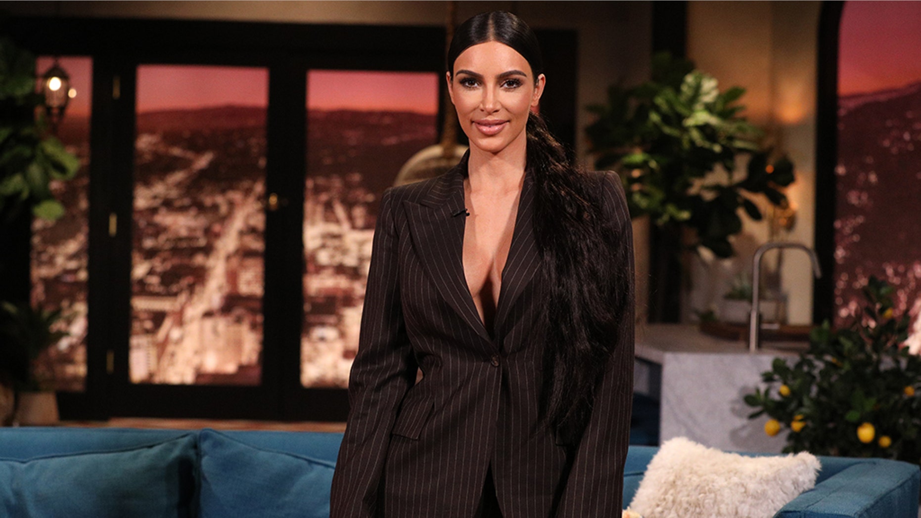 Kim Kardashian on the set of Busy Tonight.