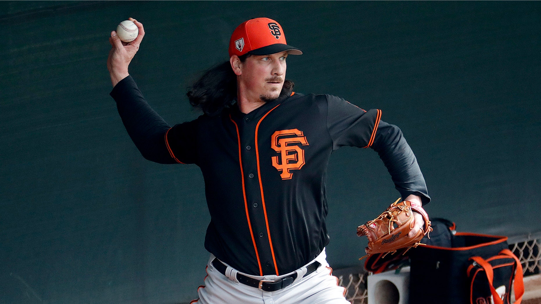 San Francisco Giants pitcher Jeff Samardzija works out during a baseball spring training practice, Wednesday, Feb. 13, 2019, in Scottsdale, Ariz.