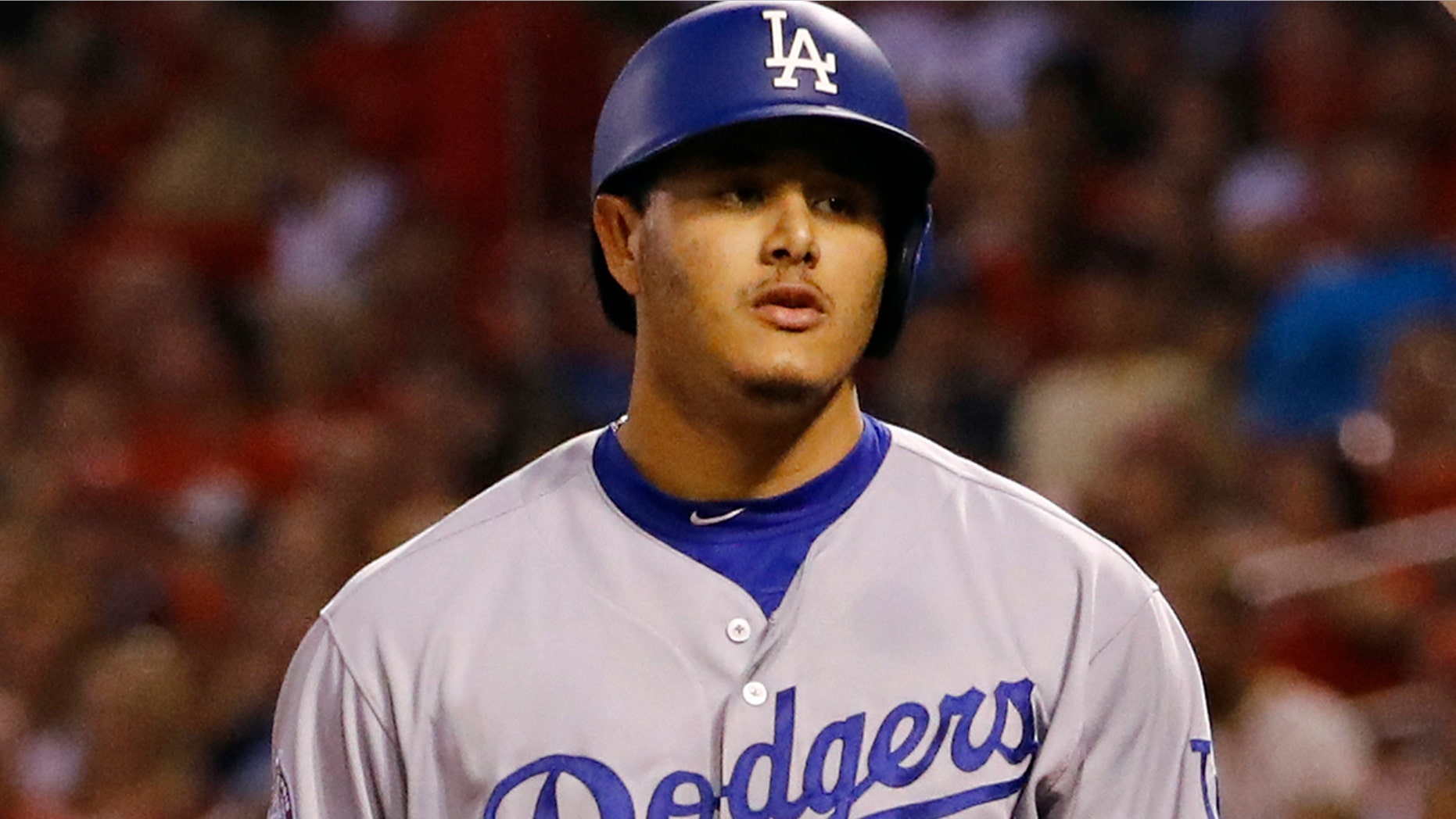 In this Sept. 14, 2018, file photo, Los Angeles Dodgers' Manny Machado flips his bat in the air after striking out during the first inning of a baseball game against the St. Louis Cardinals in St. Louis.