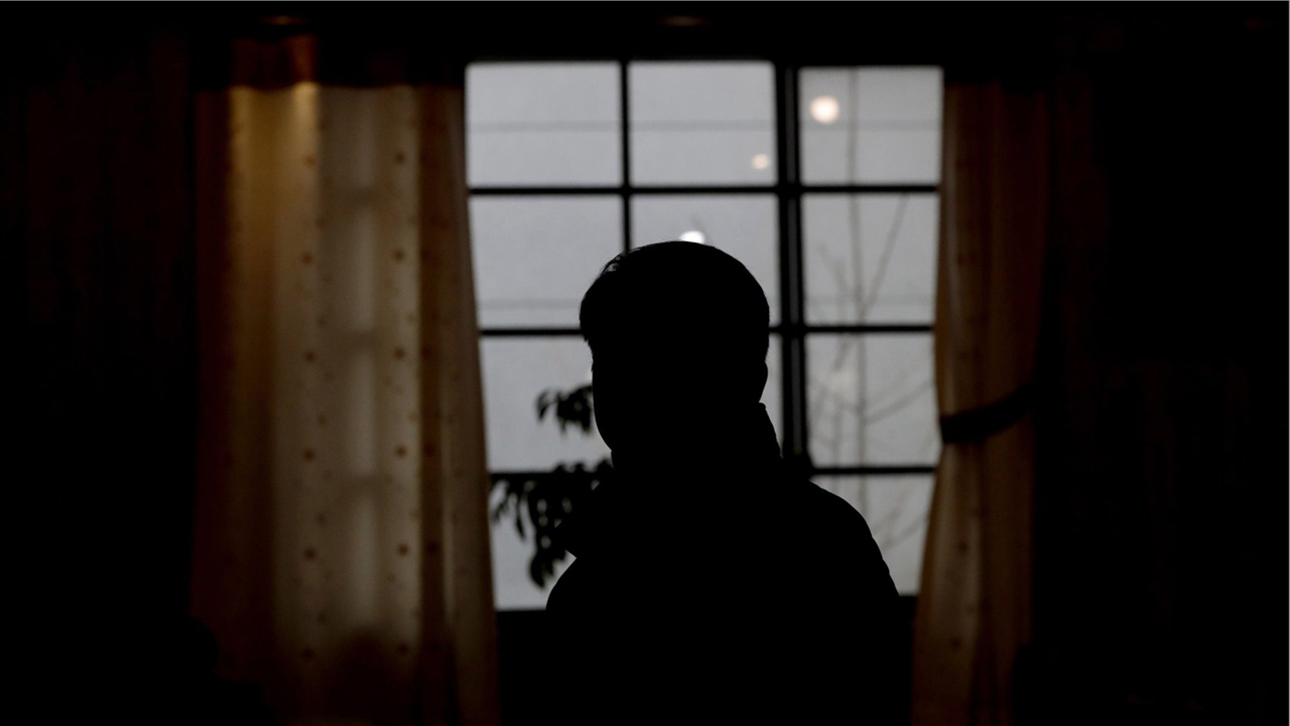 In this Jan. 21, 2019, photo, North Korean defector who wished to be identified only as J.M., sits for a photograph during an interview in Seoul, South Korea. Experts and defectors say most of North Korea’s underground Christians do not engage in the extremely dangerous work of proselytizing. Instead, they largely keep their beliefs to themselves or within their immediate families.
