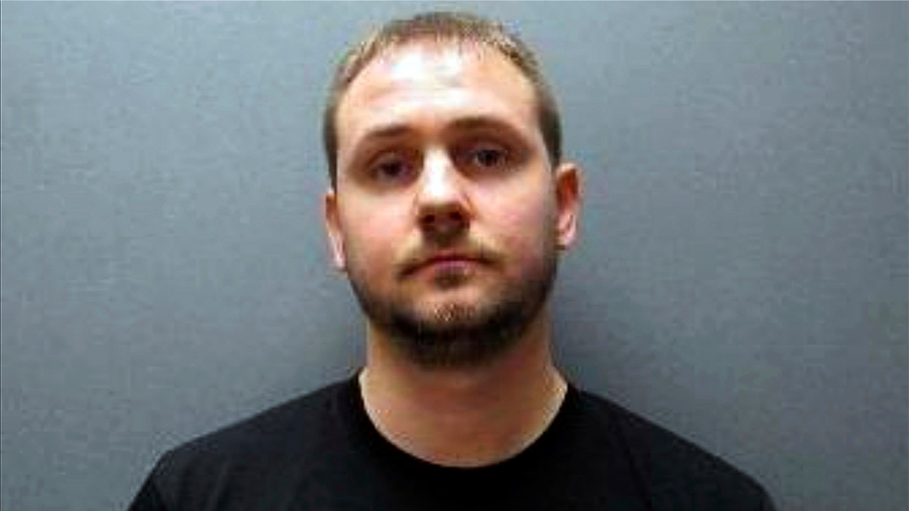 This undated booking photo released by Johnson County Sheriff's Office shows Nicholas Bridgmon. The Nebraska sheriff's deputy charged with sexually assaulting a woman more than a decade ago now is linked to at least five other victims before he joined the department in 2015. (Johnson County Sheriff's Office via AP)