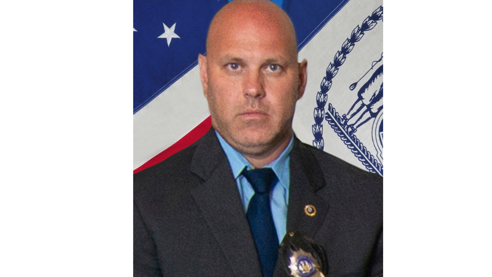 In this undated photo provided by the New York City Police Department, Det. Brian Simonsen is shown. New York Police Commissioner James O'Neill told the media at a news conference that Simonsen was shot dead by a friendly fire on Tuesday night, February 12, 2019, while he was responding to a robbery report at a T-Mobile store in the Richmond Hill section of Queens. (New York City Police Department via AP)