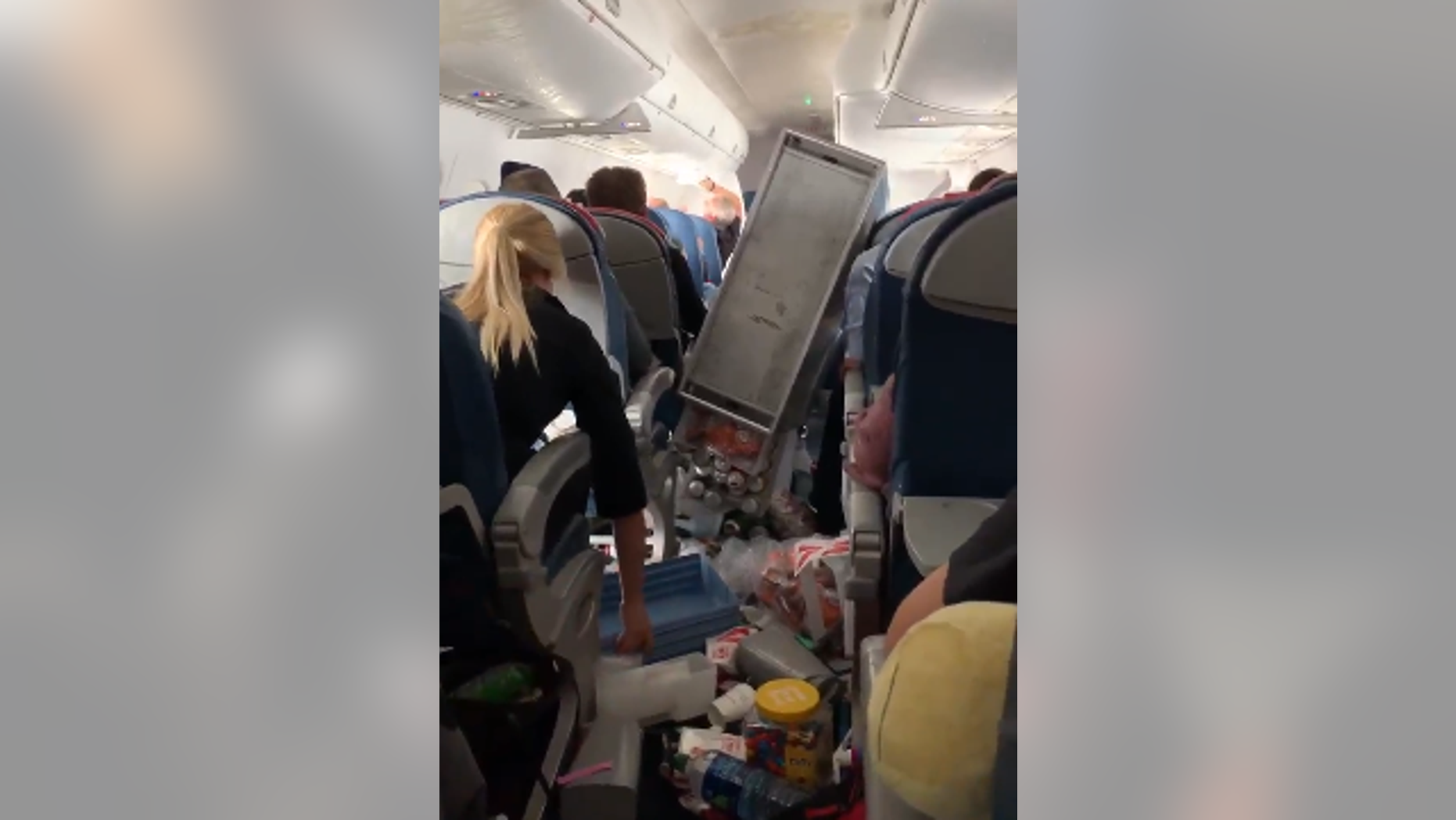 Video from a passengers phone shows the chaotic onboard the flight 5763.
