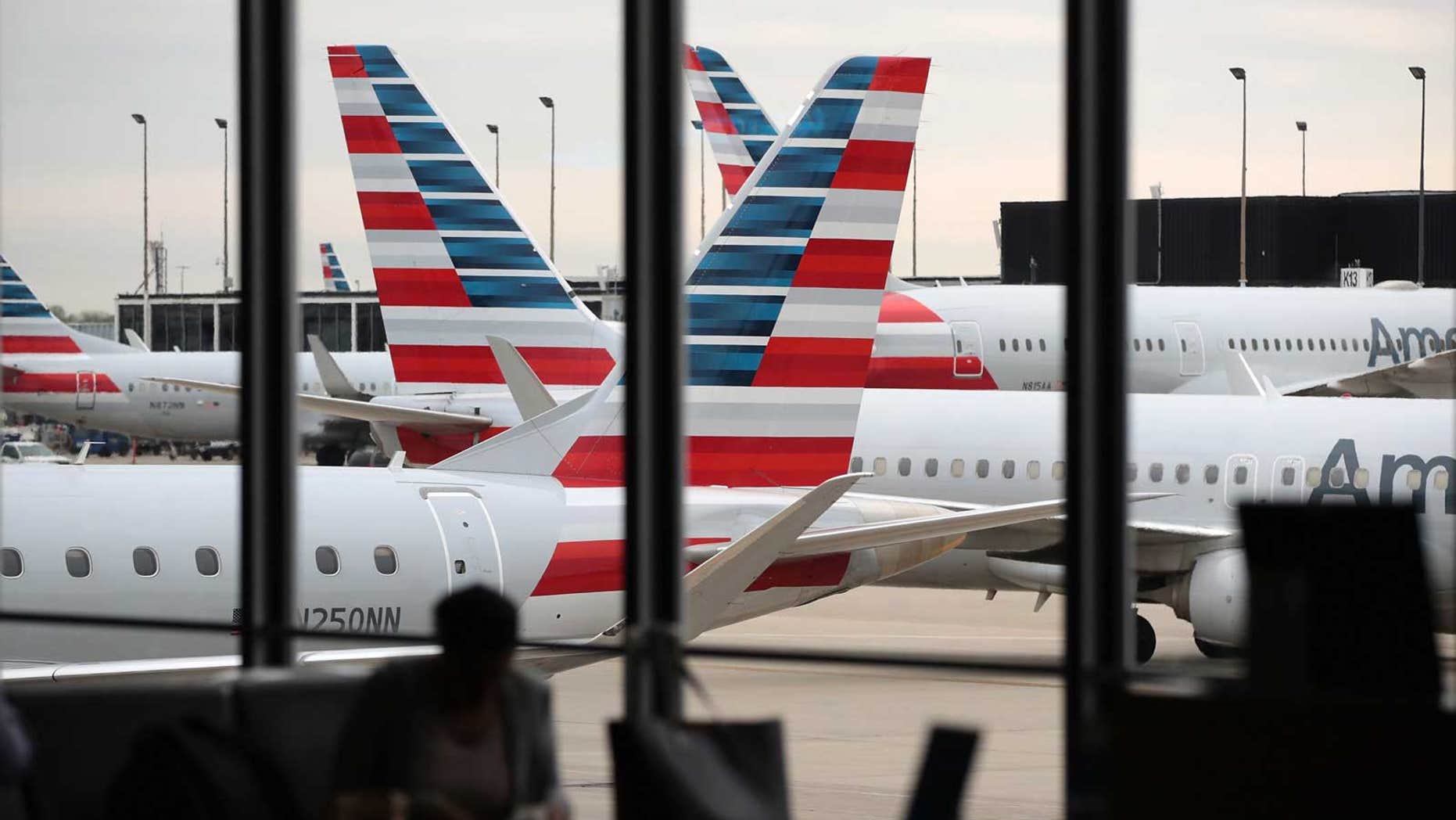 Members from a student group flying to Boston from Miami reportedly fell ill during the flight.