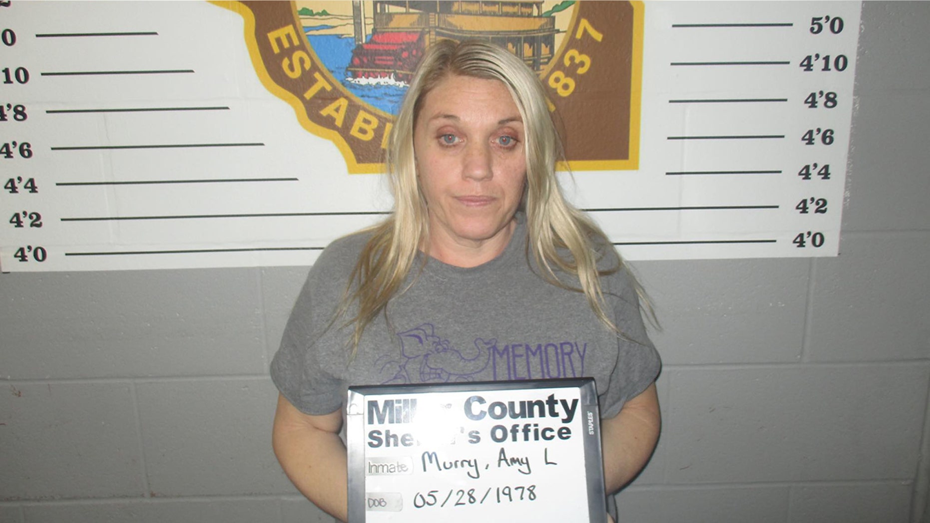 Amy Murray, 40, Ms. Iberia, Mo., was accused of her husband's poisoning primarily to marry her home.