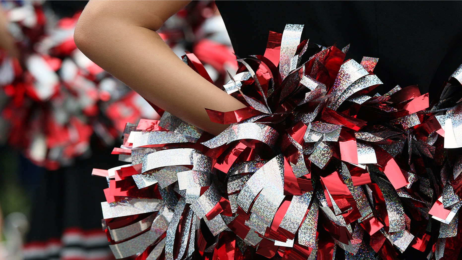 A high school in Wisconsin is under fire from simulated reviews given to cheerleaders.