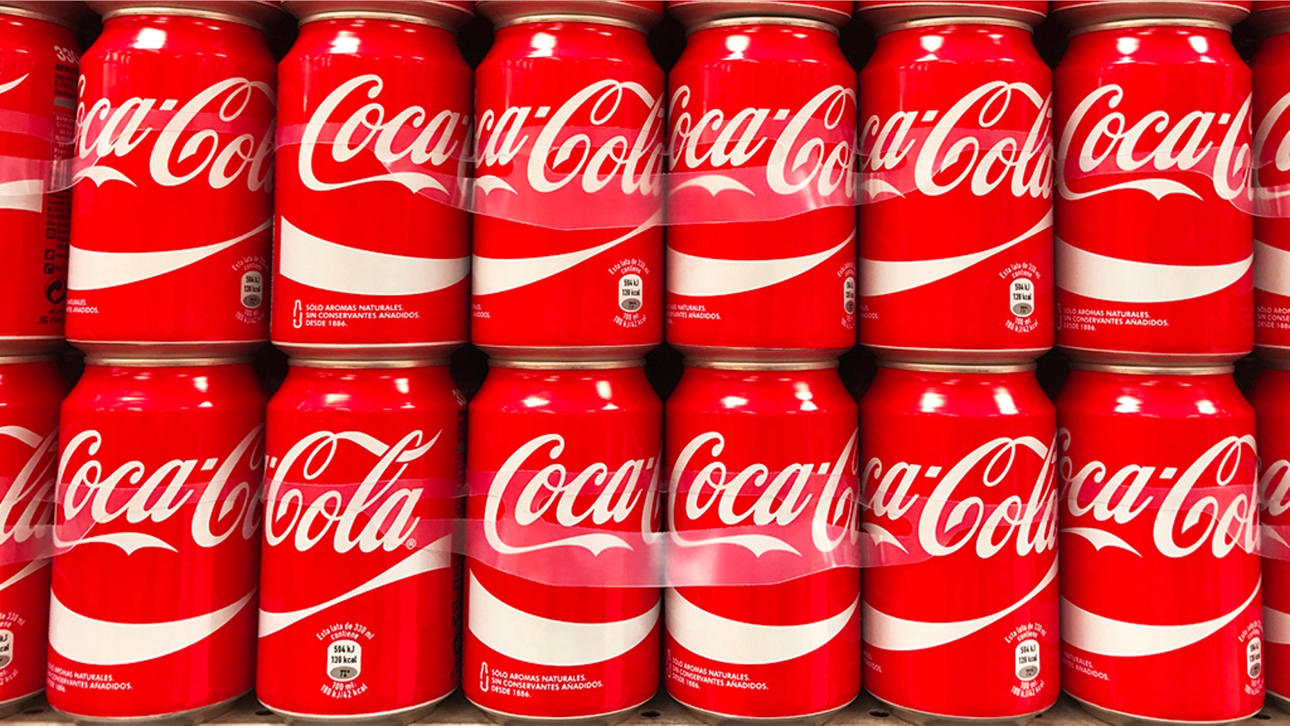 A former Coca-Coca scientist is accused of stealing trade secrets in a bid to launch a company backed by China's government.