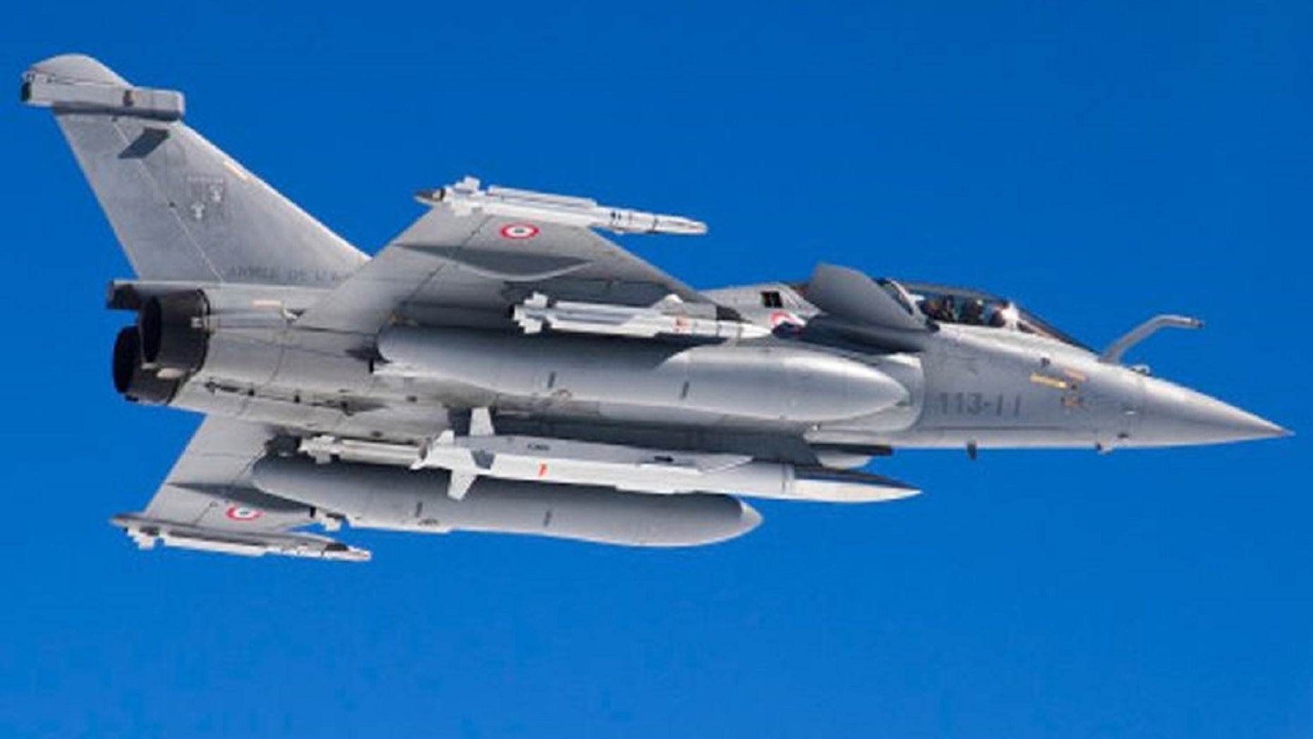 A French Rafale fighter jet equipped with nuclear cruise missiles.