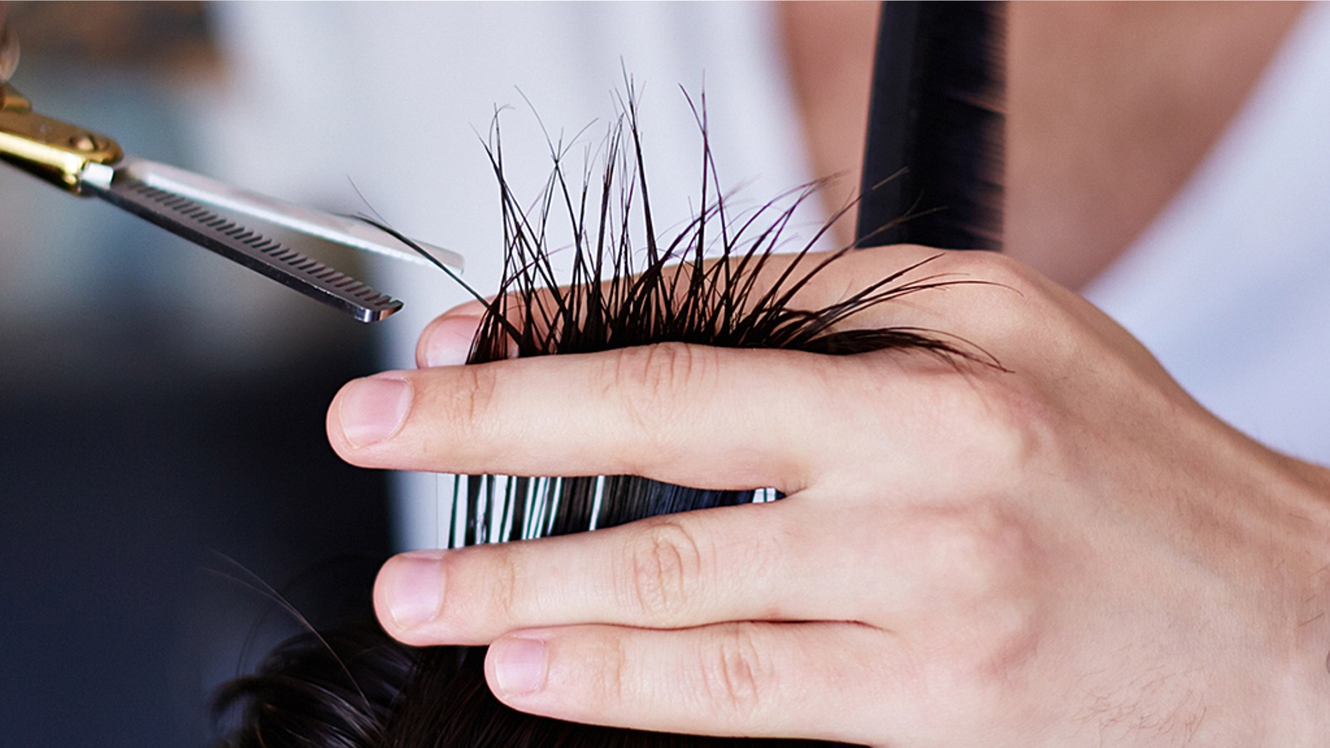 A mother claimed a teacher cut her son's hair.