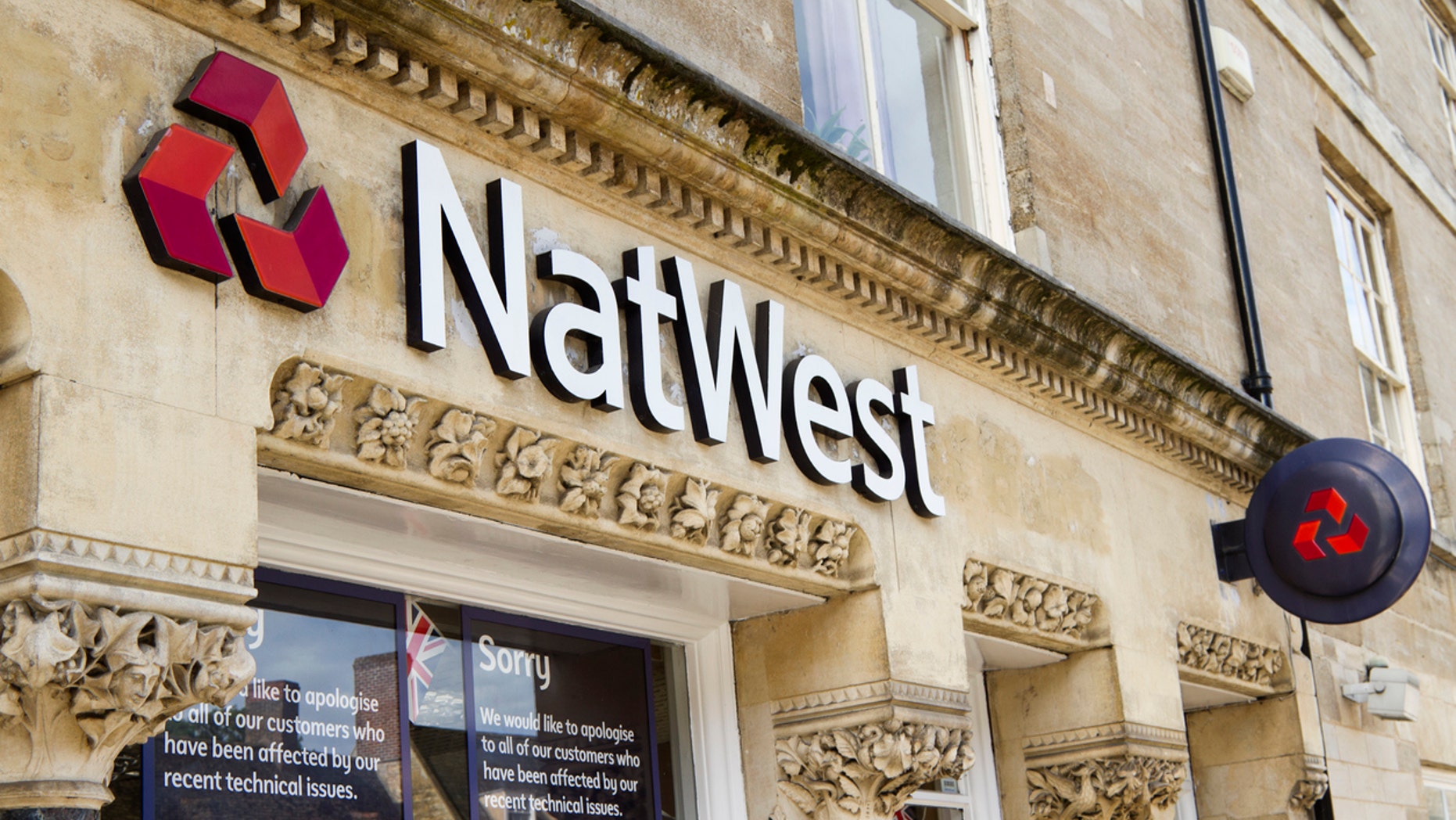 The woman claims she told the bank worker she was a vegan, prompting the outburst.