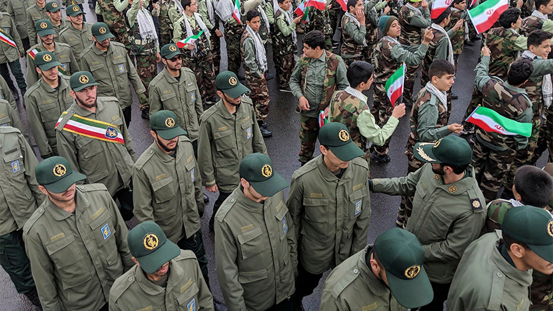 Iran suicide bomb attack targeting Revolutionary Guard bus leaves at least 20 dead Iran-revolutionary-guard