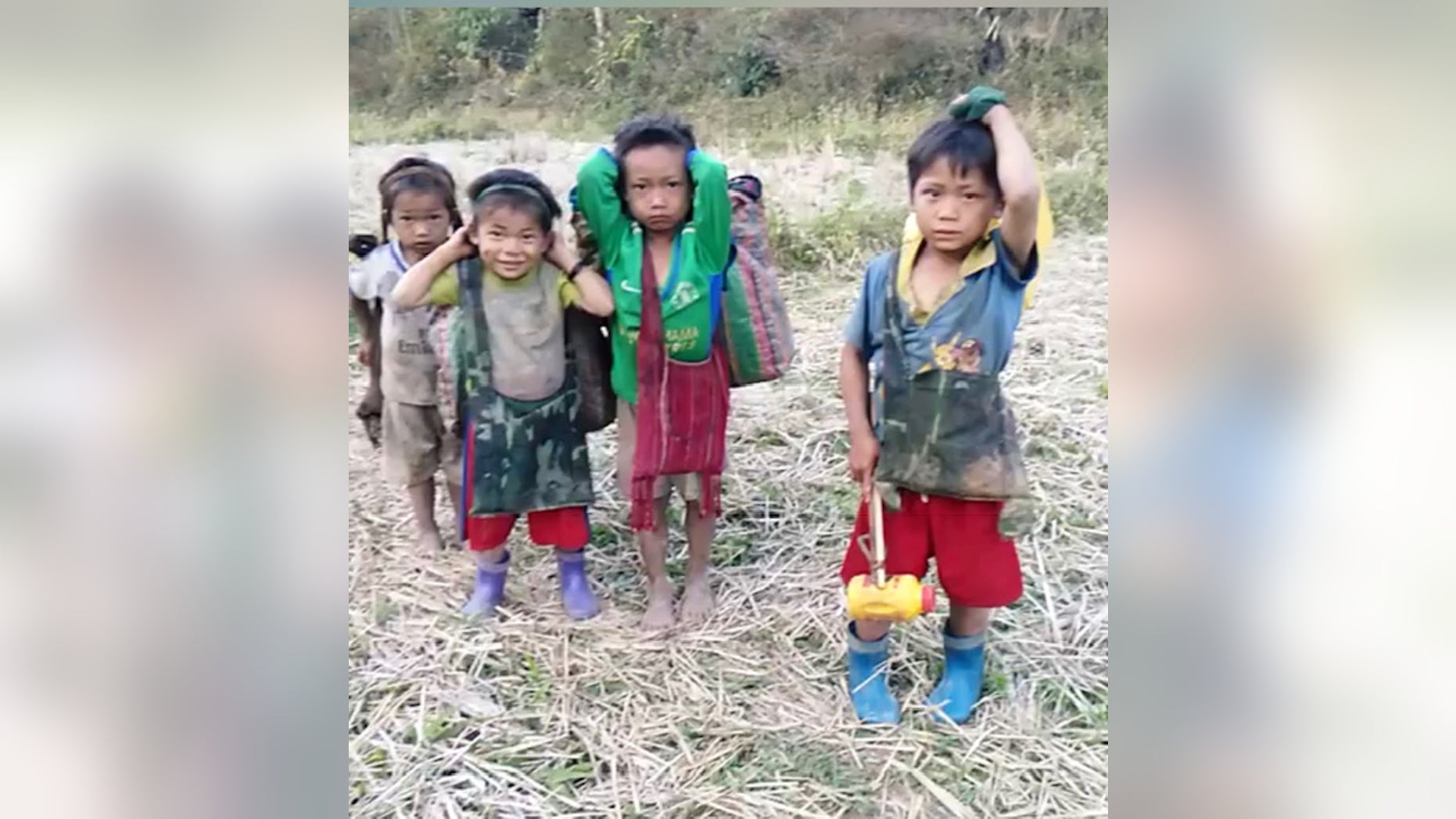 Karen children flee their homes in Burma on January 25, 2019