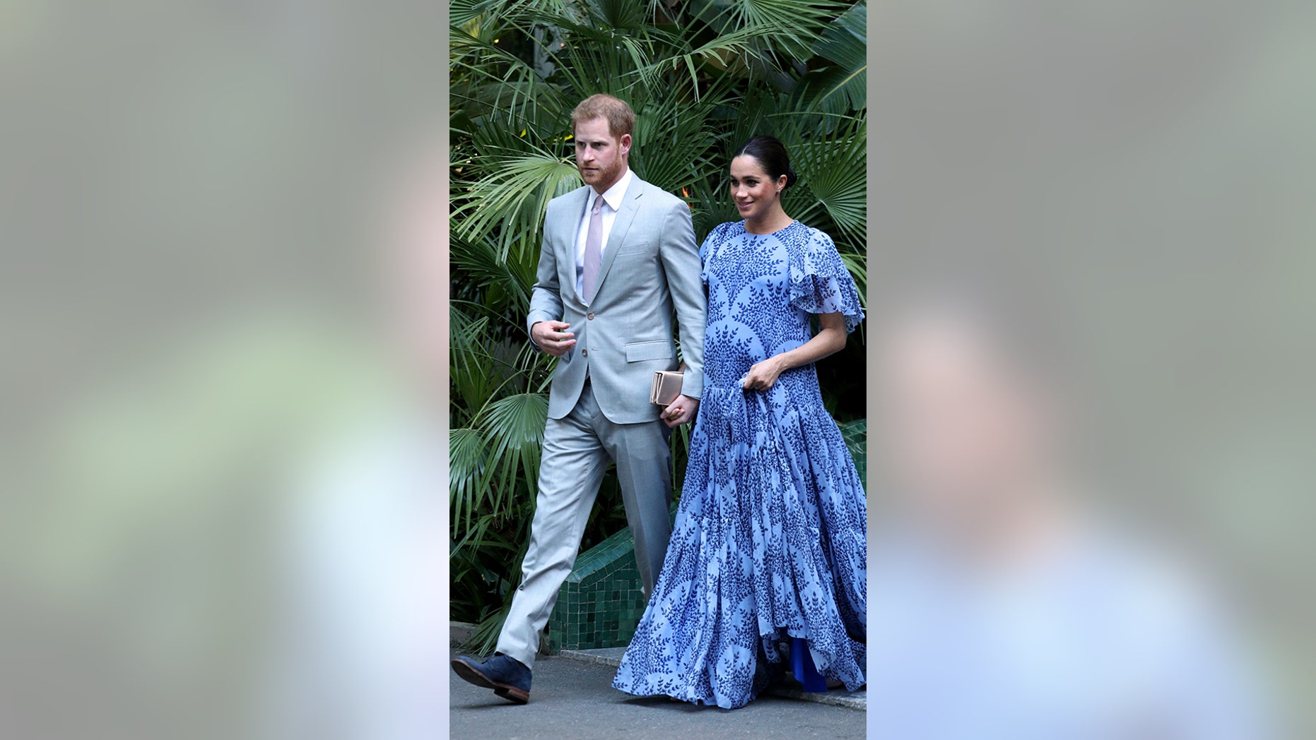 Britain's Prince Harry, left and Meghan, the Duchess of Sussex, leave the residence of Mohammed VI of Morocco, on the third day of their tour of Morocco, in Rabat, Monday, Feb. 25, 2019.