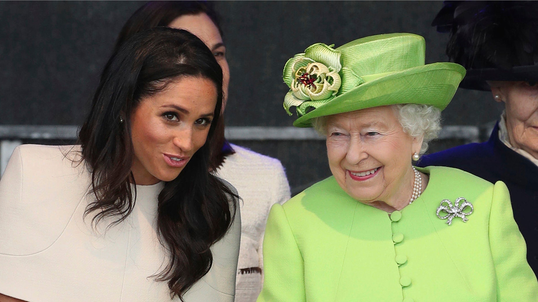 Queen Elizabeth II and Meghan, Duchess of Sussex, on the left, attend the unveiling of the new Mersey Gateway Bridge, in Widnes, North West England, on Thursday. June 14, 2018.