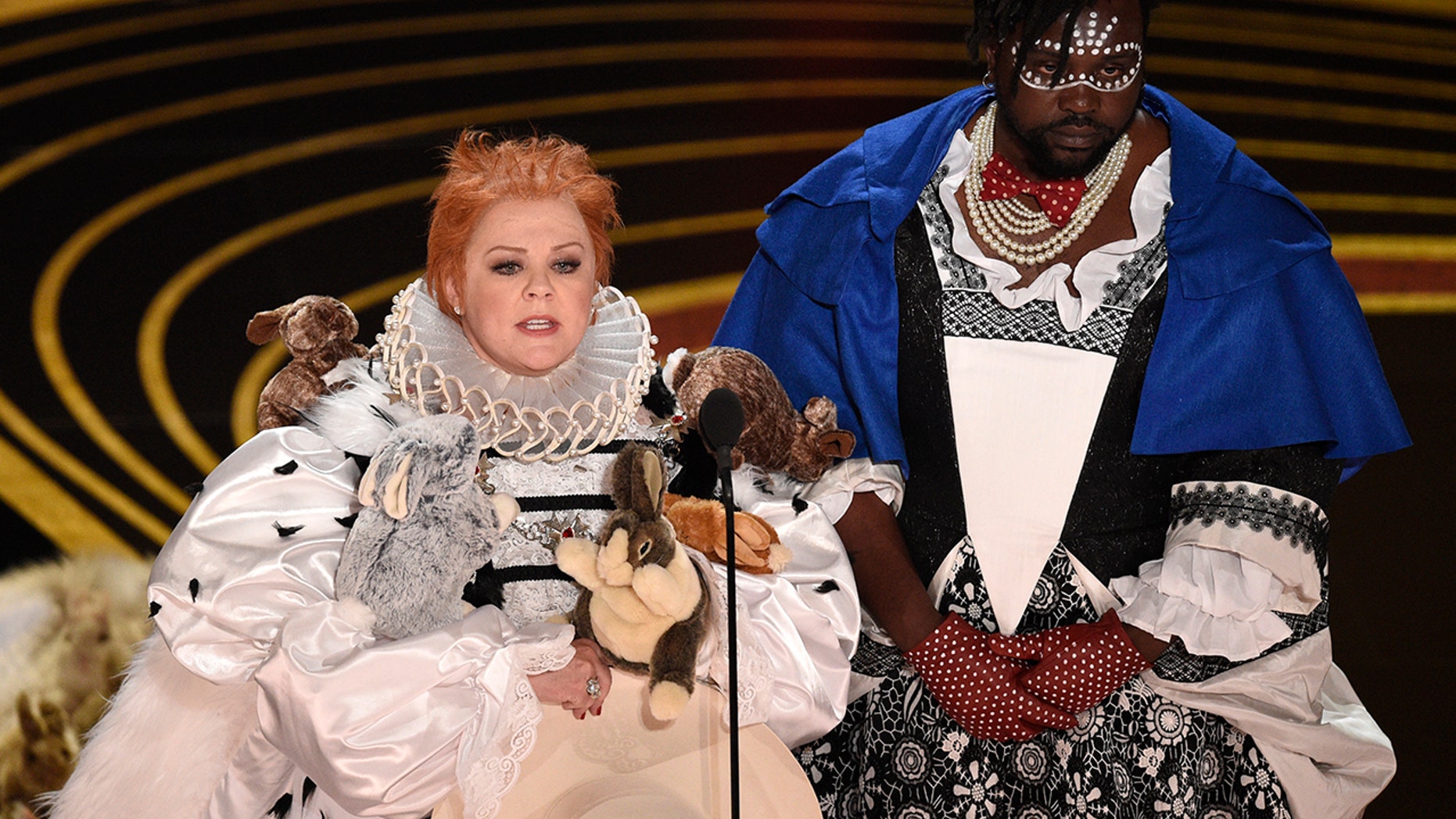 Top: Oscars presenter Melissa McCarthy spoofs 'The Favourite' with bunny-covered ...