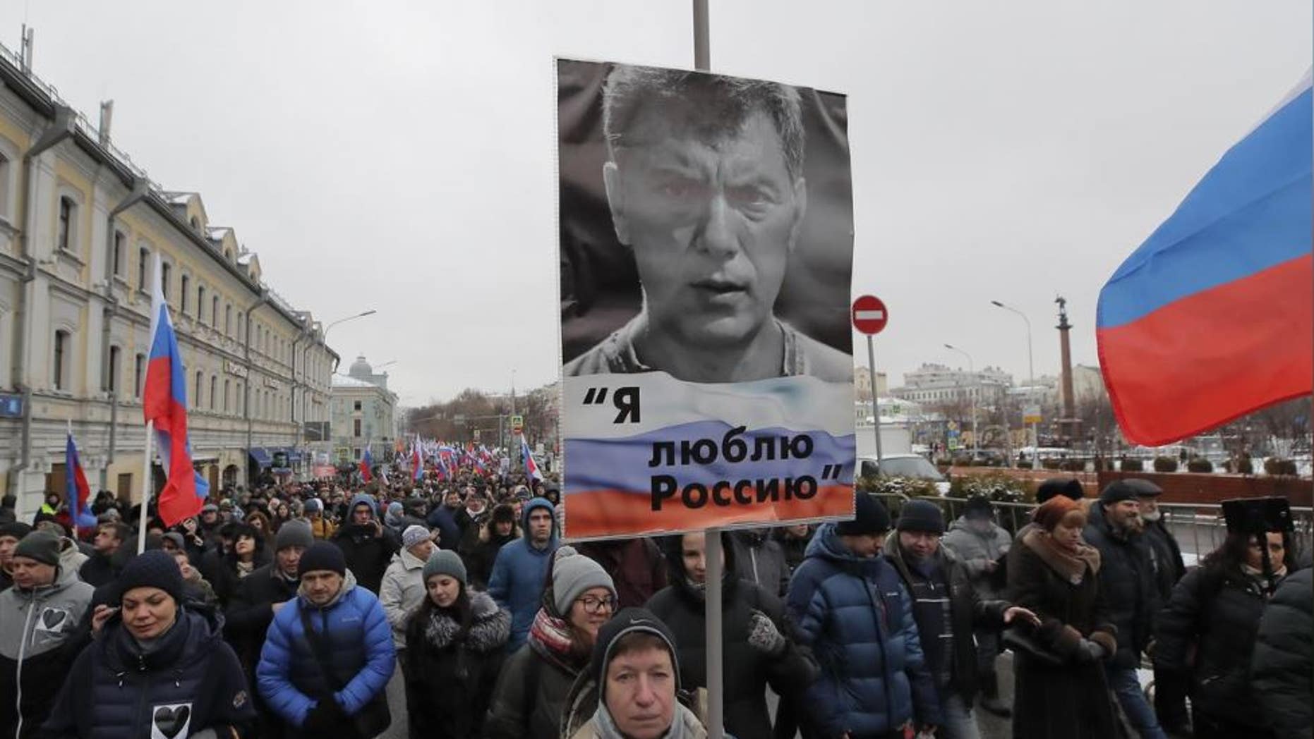 People attend a rally in memory of Russian opposition politician Boris Nemtsov who was assassinated in 2015 in Moscow Russia