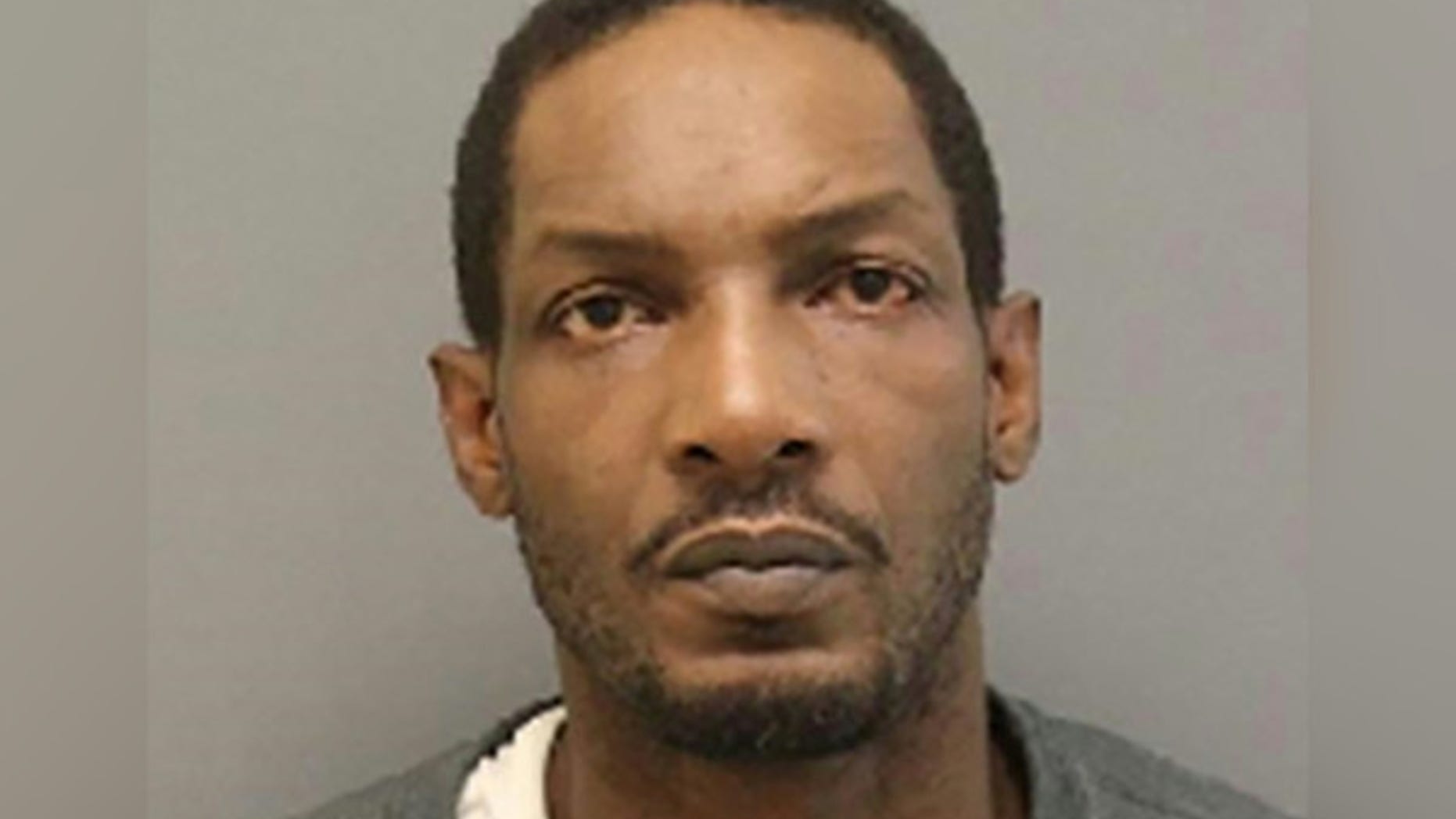Antonio Smallwood was allegedly projecting pornographic material on his garage door when police arrived.