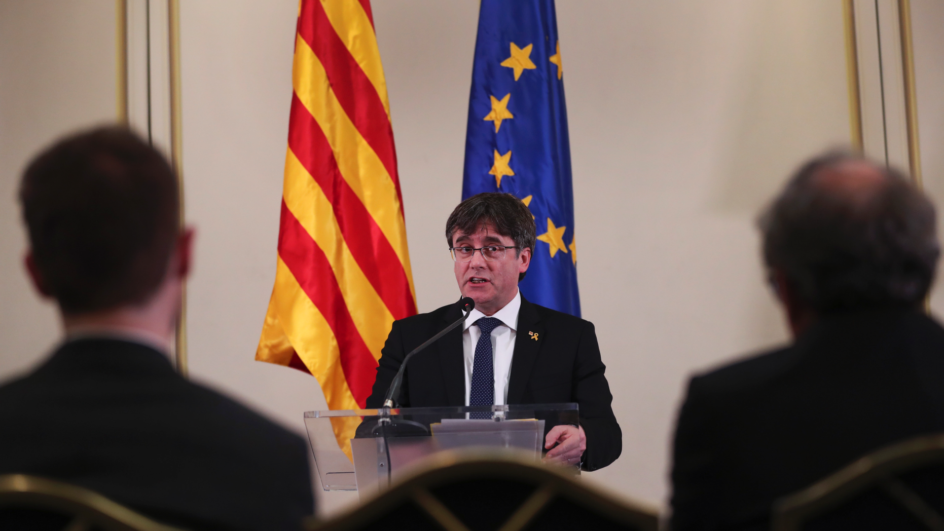 FILE - In this Feb. 18, 2019 file photo, Catalonia's former regional president. Carles Puigdemont, addresses a conference in Brussels. A political group that wants Catalonia to break away from Spain and become an independent country said on Sunday, March 10, 2019, that Puigdemont is running for a seat in the European Parliament even though the Spanish government considers him a fugitive. (AP Photo/Francisco Seco, File)