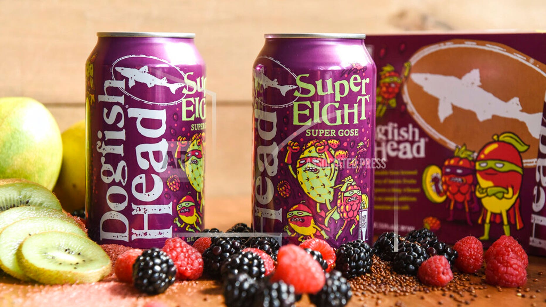In this undated photo of Dogfish Head Craft Brewery, cans of Superfish beer from Dogfish are displayed on a table in Milton, Del. The new beer coming onto the market can be used for the development of its Super 8 film. Delaware's Dogfish Head Craft Brewery created their SuperEIGHT beer following a conversation with the people of Kodak, the renowned New York-based technology company famed for its photographic roots. (Dogfish Head Craft Brewery on AP)