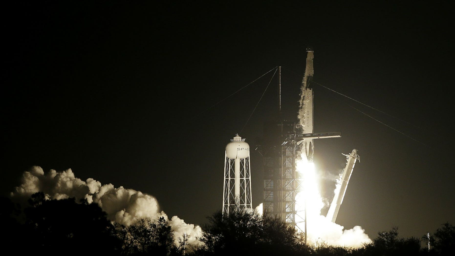 A Falcon 9 SpaceX rocket, ready for launch, sits on pad 39A at the Kennedy Space Center in Cape Canaveral, Fla., Friday, March 1, 2019. The Crew Dragon spacecraft unmanned test flight launched early Saturday morning. (Associated Press)