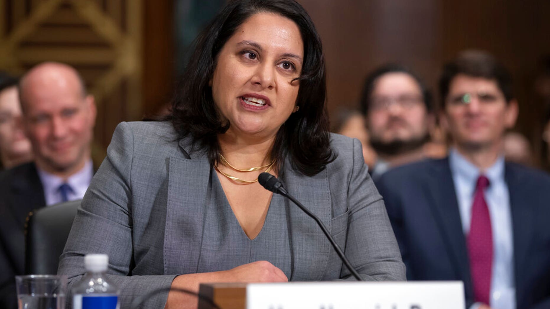 In this Feb. 5, 2017, photo, Neomi Rao, then President Trump's nominee for a seat on the D.C. Circuit Court of Appeals, appears before the Senate Judiciary Committee for her confirmation hearing, on Capitol Hill in Washington. (AP Photo/J. Scott Applewhite)