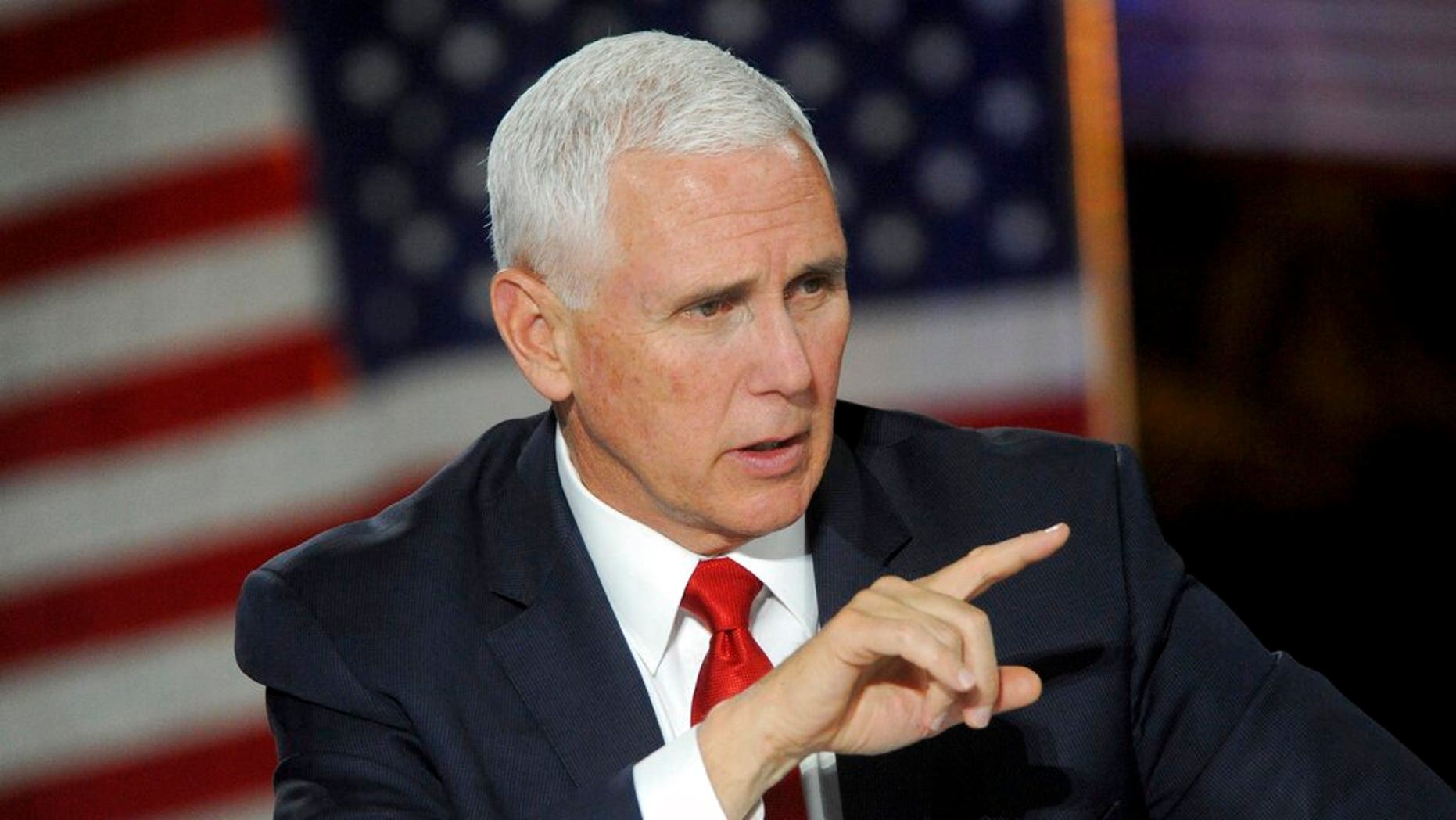 Vice President Mike Pence at the fifth National Space Council meeting calling for landing astronauts on the moon within five years. (Associated Press)