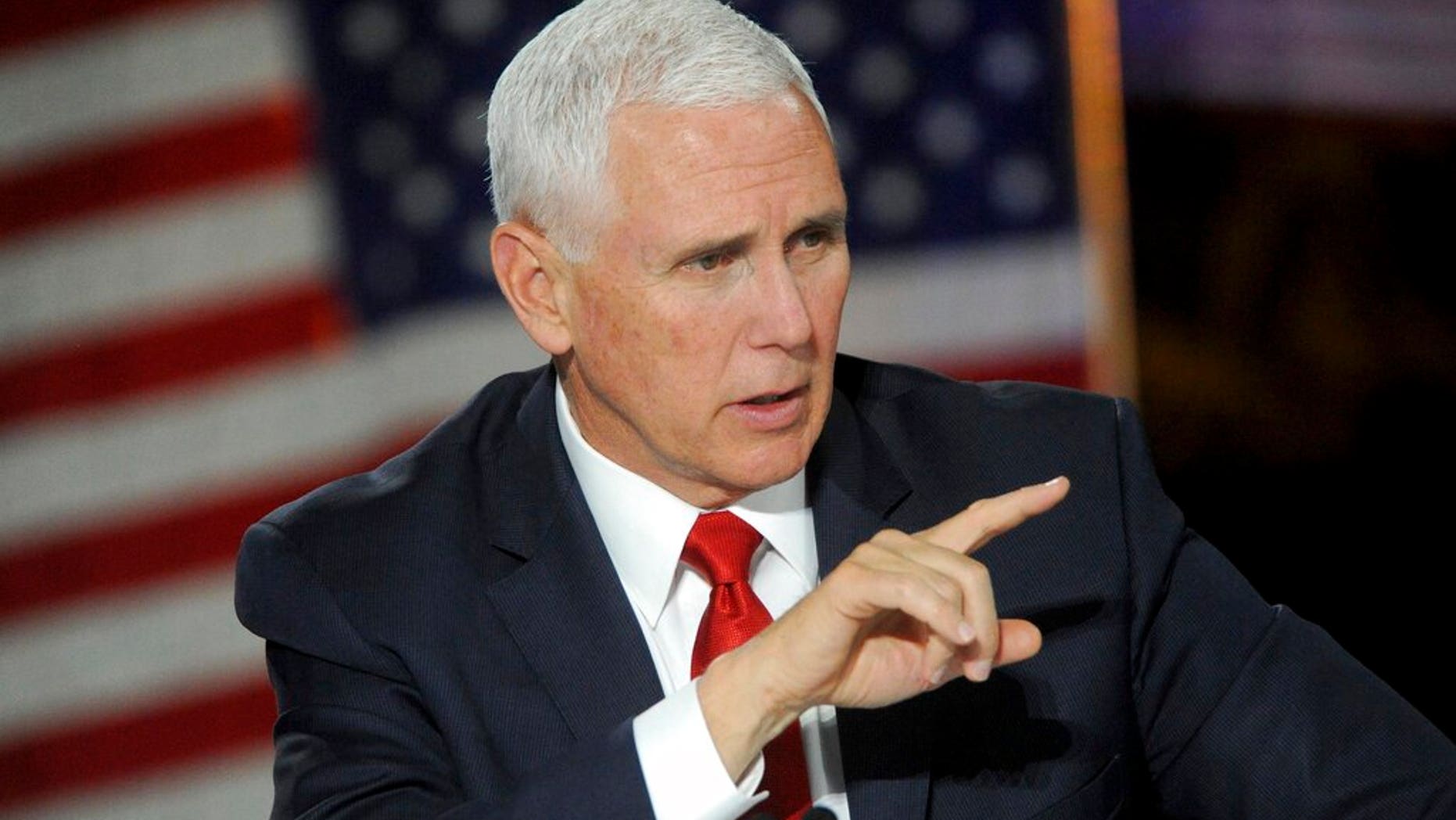 Vice President Mike Pence at the fifth National Space Council meeting calling for landing astronauts on the moon within five years. (Associated Press)