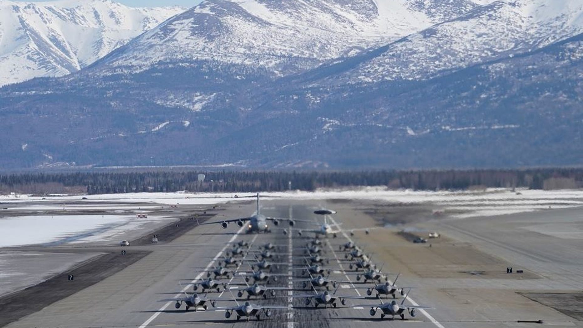A squadron of Air Force jets participating in an “elephant walk.”