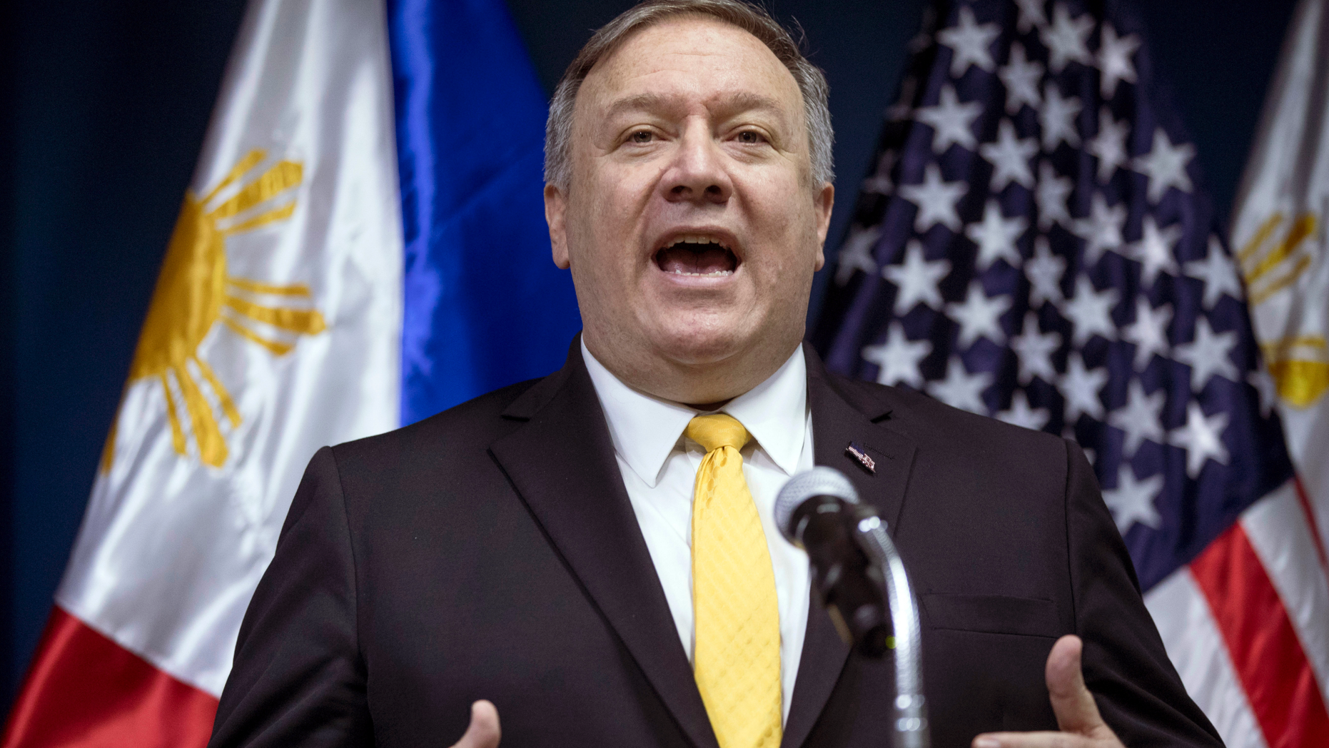 FILE - In this March 1, 2019, file photo, U.S. Secretary of State Mike Pompeo speaks during a news conference with Philippines Foreign Secretary Teodoro Locsin Jr. at the Philippines Department of Foreign Affairs Home Office in Manila, Philippines. The United States is more likely to be involved in a "shooting war" in the disputed South China Sea than the Philippines but the latter would be embroiled in such a conflict just the same because of its 1951 Mutual Defense Treaty with Washington, the Philippine defense chief said Tuesday, March 5, 2019. (AP Photo/Andrew Harnik, Pool, File)