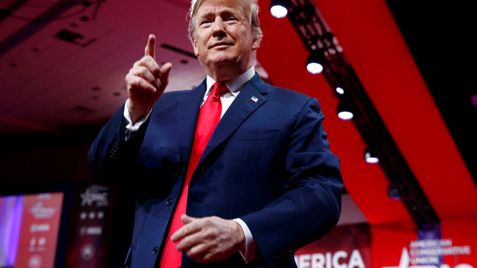 President Donald Trump looks to the cheering audience as he arrives to speak at Conservative Political Action Conference, CPAC 2019, in Oxon Hill, Md., Saturday, March 2, 2019.