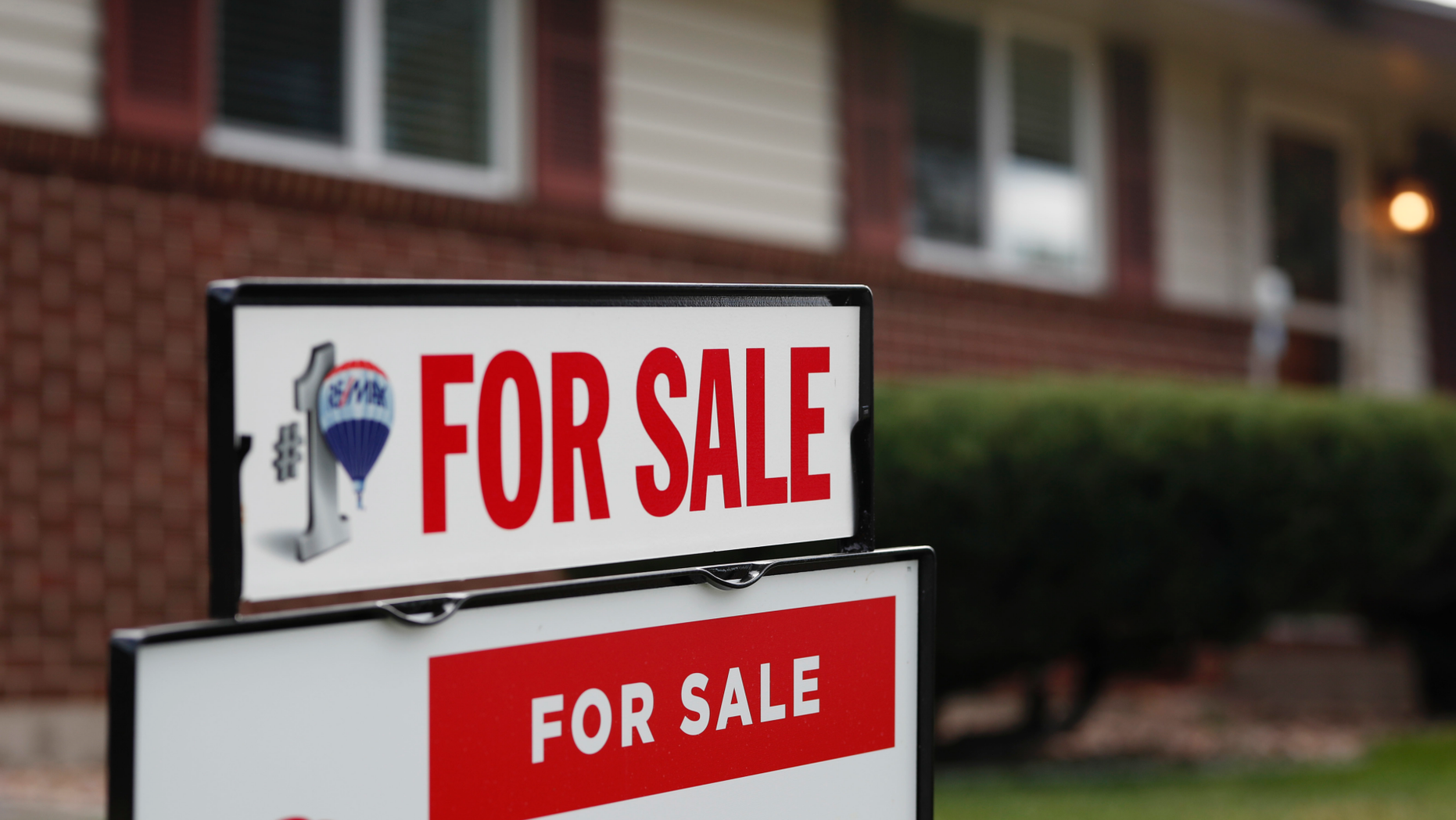 FILE - In this Oct 2, 2018 file photo, a for sale sign stands outside a home on the market in the north Denver suburb of Thornton, Colo. U.S. home sales soared 11.8 percent in February, 2019 aided by accelerating wages and falling mortgage rates that are improving affordability. The National Association of Realtors says that existing homes sold at a seasonally adjusted annual rate of 5.51 million last month, a decisively sharp rebound from a pace of 4.94 million in January. (AP Photo/David Zalubowski, File)