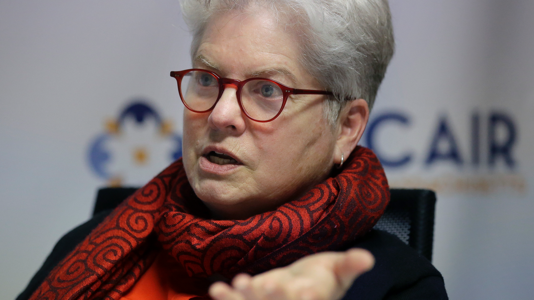 Council on American-Islamic Relations Massachusetts Civil Rights Director Barbara Dougan takes questions from a reporter from The Associated Press, Wednesday, March 27, 2019, in Boston. The state's largest Islamic advocacy organization is releasing its first annual report on the civil rights abuses faced by local Muslims. (AP Photo/Steven Senne)