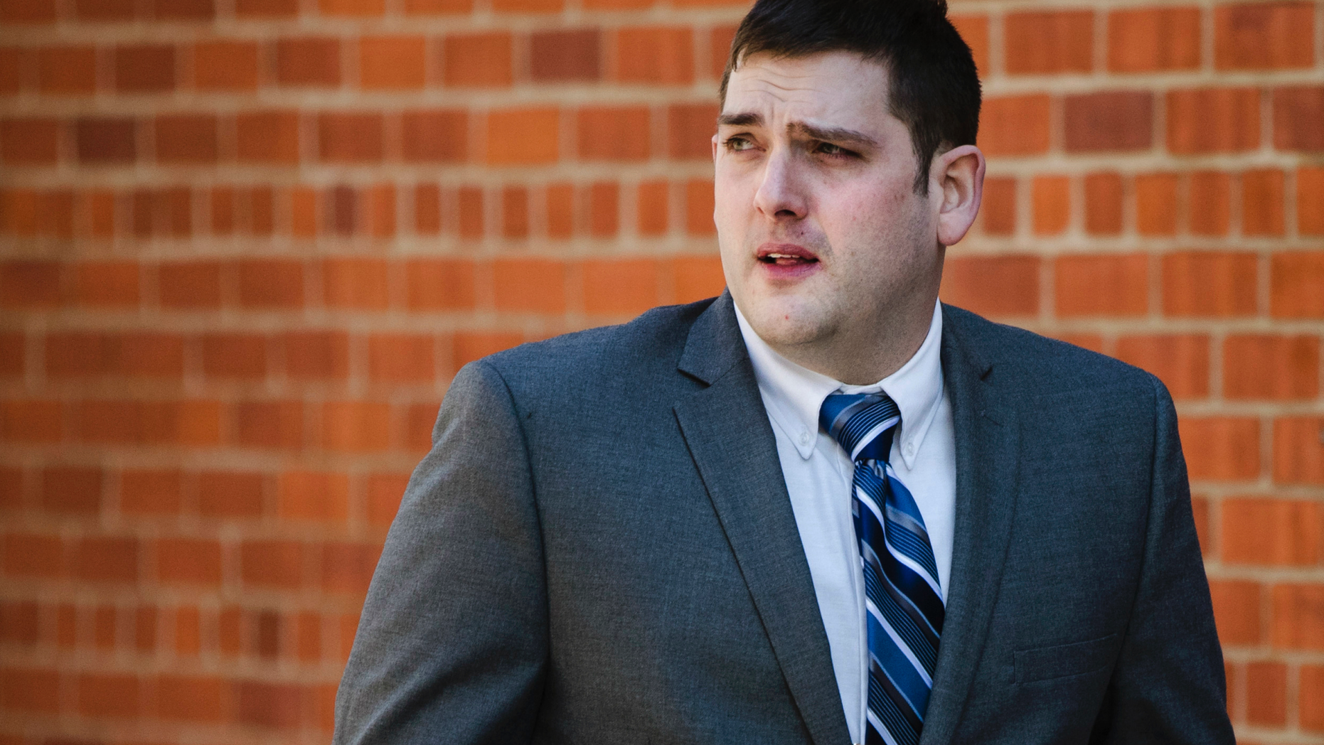 In this March 12, 2019 file photo, former East Pittsburgh police officer Michael Rosfeld, charged with homicide in the shooting death of Antwon Rose II, walks to the Dauphin County Courthouse in Harrisburg, Pa. On the fourth day of the trial in Pittsburgh, Friday March 22, 2019, Rosfeld was acquitted of all counts in the death of Rose. (AP Photo/Matt Rourke)