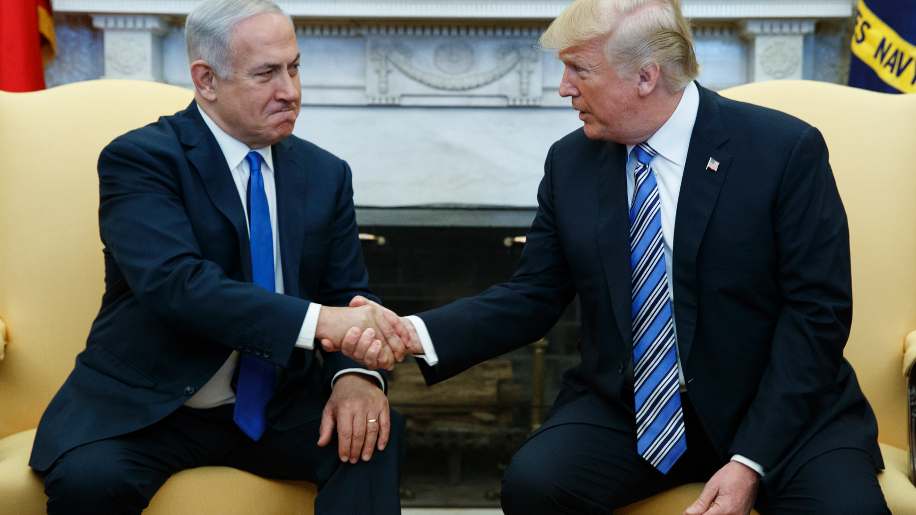 FILE - In this March 5, 2018, file photo, President Donald Trump meets with Israeli Prime Minister Benjamin Netanyahu in the Oval Office of the White House in Washington. Trump and Netanyahu have had a mutually beneficial relationship unlike perhaps that of any previous leader of either country, with Trump’s surprise recognition of Israel’s sovereignty over the Golan Heights just the most recent example. Trump’s precedent-breaking steps have boosted his own profile with pro-Israel groups in the U.S. and given a boost to Netanyahu at the height of campaigning in the unexpectedly tense Israeli election. (AP Photo/Evan Vucci, File)