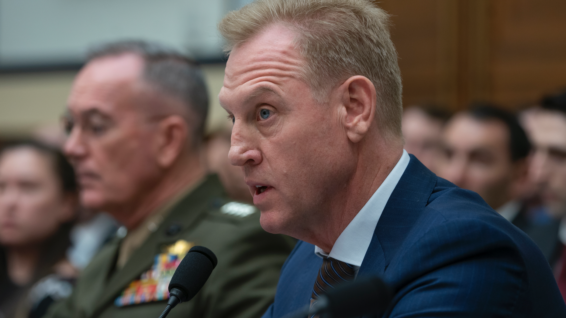 Acting Defense Secretary Patrick Shanahan, joined at left by Chairman of the Joint Chiefs of Staff Gen. Joseph F. Dunford, testifies at a House Armed Services Committee hearing on the fiscal year 2020 Pentagon budget, on Capitol Hill in Washington, Tuesday, March 26, 2019. Lawmakers are concerned about military construction projects that could lose funding this year to pay for President Donald Trump's border wall. (AP Photo/J. Scott Applewhite)