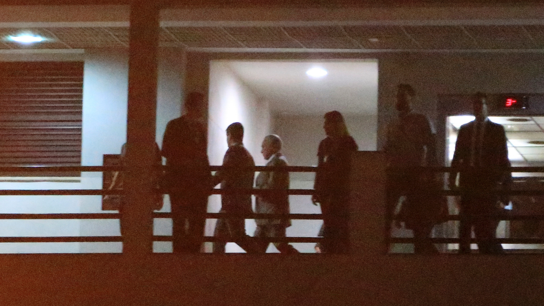 Former Brazilian President Michel Temer, center, arrives to the Federal Police headquarters in Rio de Janeiro, Brazil, Thursday, March 21, 2019. In a statement, the Prosecutors Office in Rio de Janeiro said that Judge Marcelo Breitas had issued an arrest warrant for Temer, as well as Moreira Franco, a former minister and close ally of Temer, and eight others. (AP Photo/Bruna Prado)