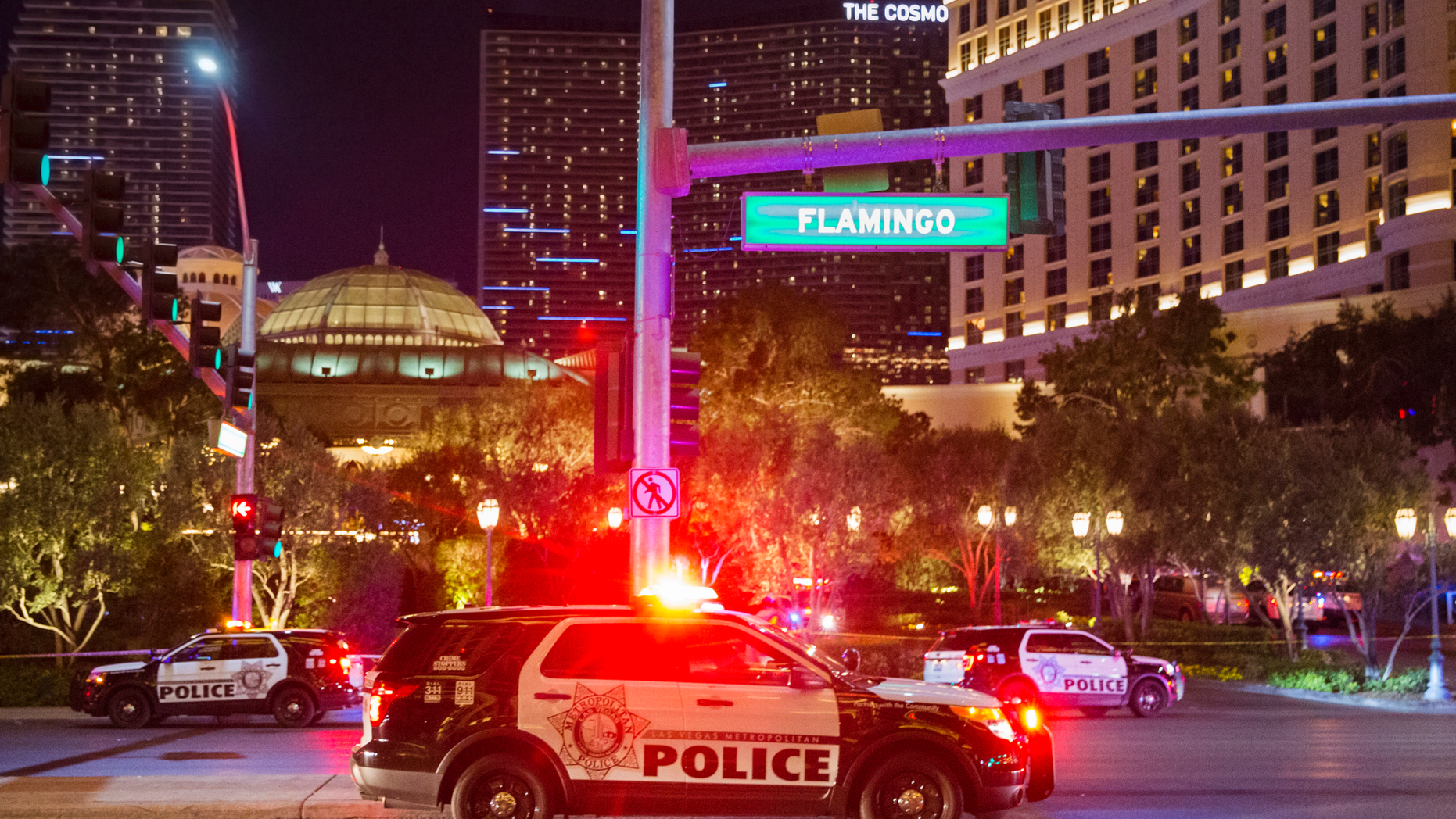 Las Vegas police respond to an officer-involved shooting in front of Bellagio on Friday, March 15, 2019, in Las Vegas. (Benjamin Hager/Las Vegas Review-Journal via AP)