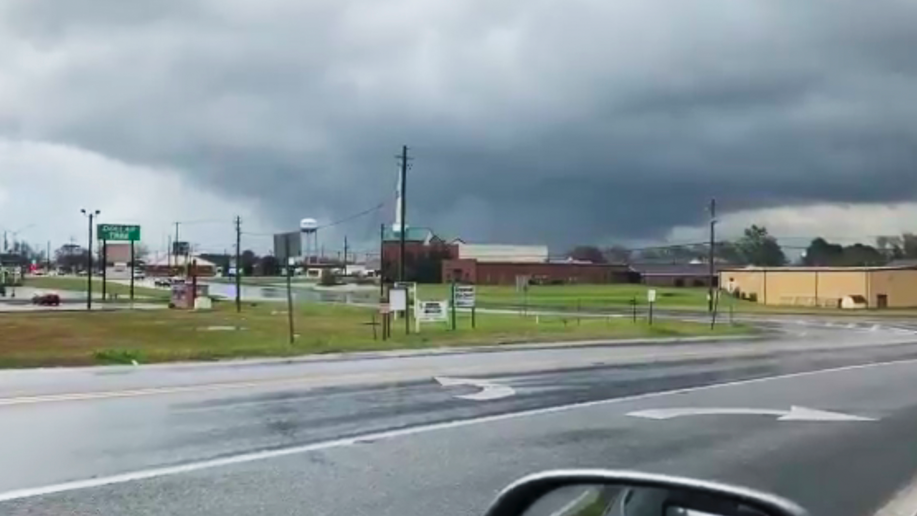 This photo provided by Greg Martin shows a funnel cloud in Byron, Ga., Sunday, March 3, 2019. The National Weather Service on Sunday issued a series of tornado warnings stretching from Phenix City, Alabama, near the Georgia state line to Macon, Georgia, about 100 miles (160 kilometers) to the east. (Greg Martin via AP)