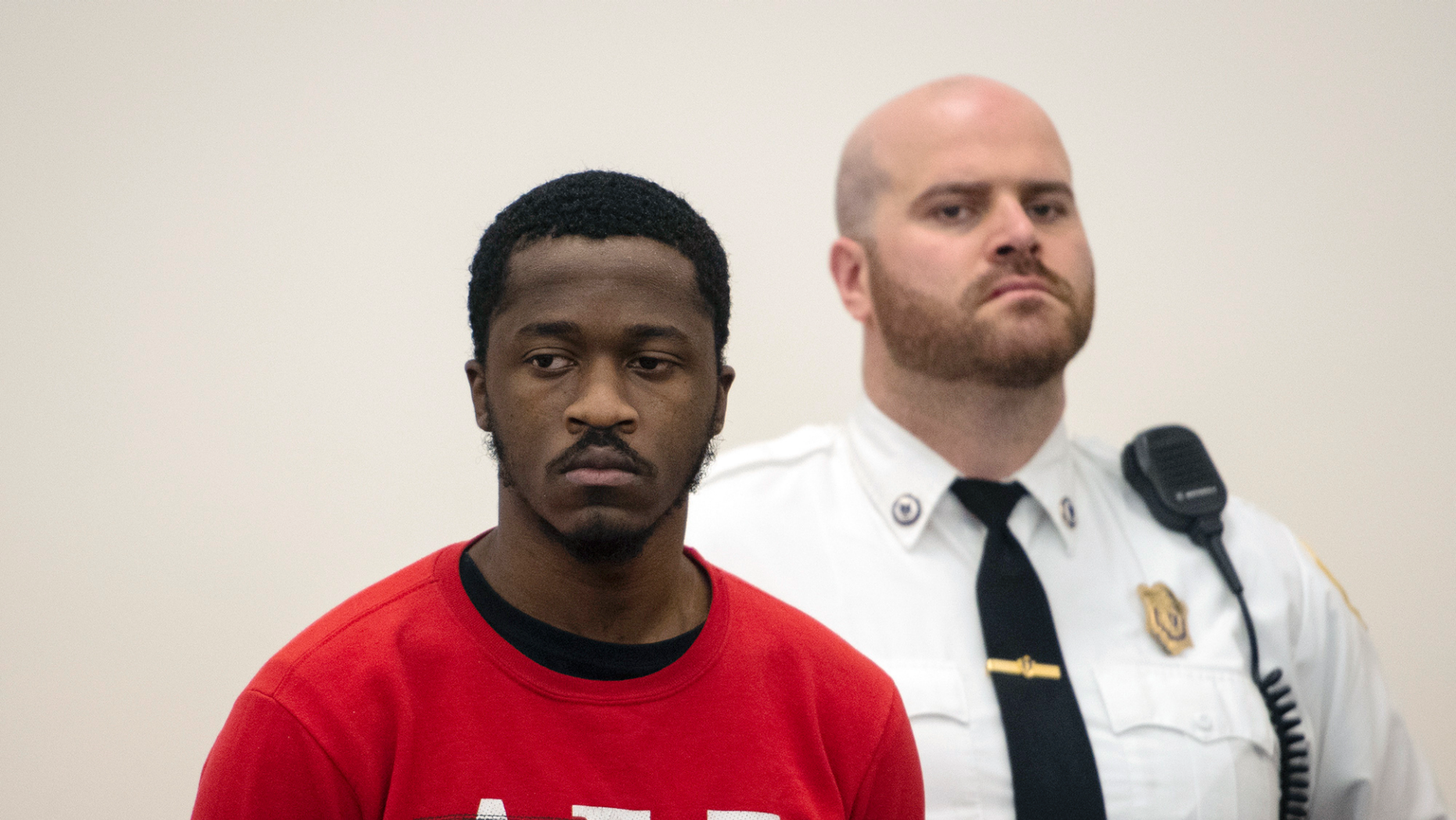 Momoh Kamara, 21, of West Boylston, is appearing in Worcester Superior Court on Friday, March 15, 2019 in Worcester, Massachusetts. Worcester District Attorney, Joseph Early Jr., announced Friday that a former tenant, Momoh Kamara, 21, had charged with second-degree murder, arson and burglary. (Ashley Green / Worcester Telegram & Gazette via AP)