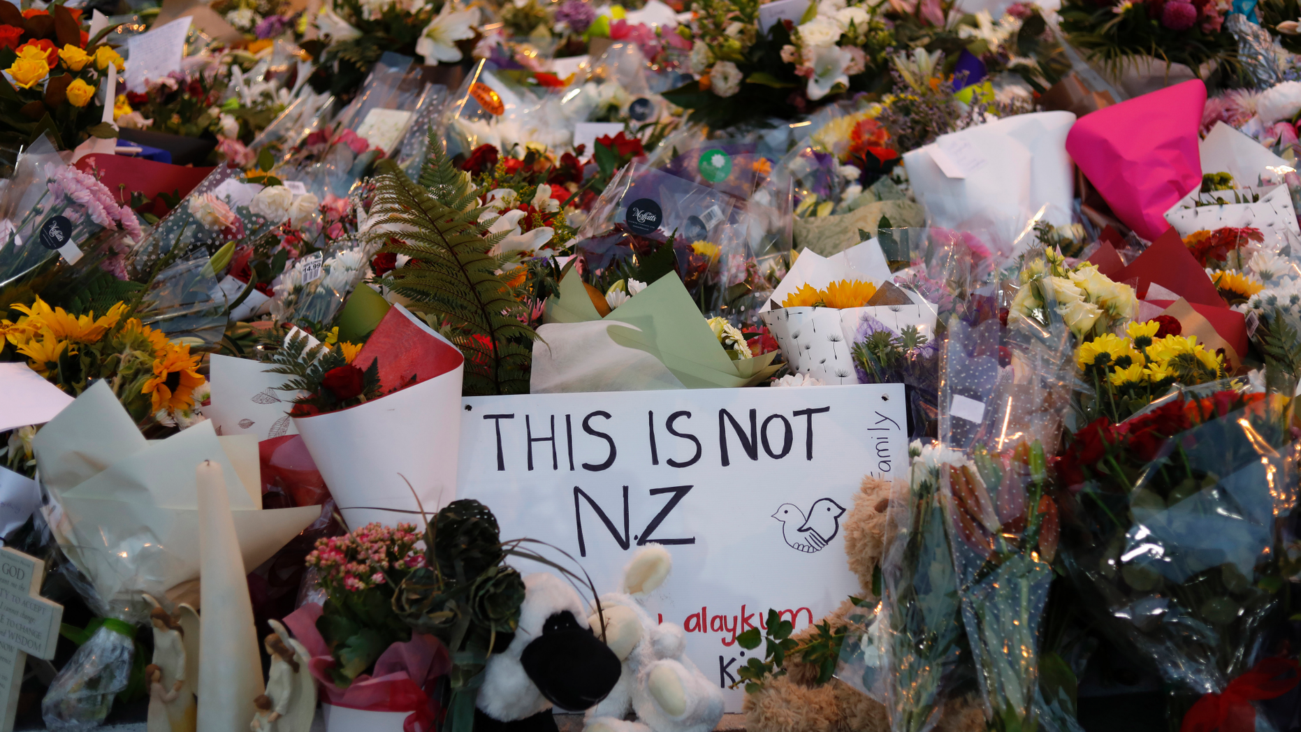 In this Saturday, March 16, 2019, file photo, flowers lay at a memorial near the Masjid Al Noor mosque for victims in last week's shooting in Christchurch, New Zealand. The leafy New Zealand city where a self-proclaimed racist fatally shot 50 people at mosques during Friday prayers is known for its picturesque meandering river and English heritage. For decades, the southern city of Christchurch also has been the center of the country's small but persistent white supremacist movement. (AP Photo/Vincent Yu, File)
