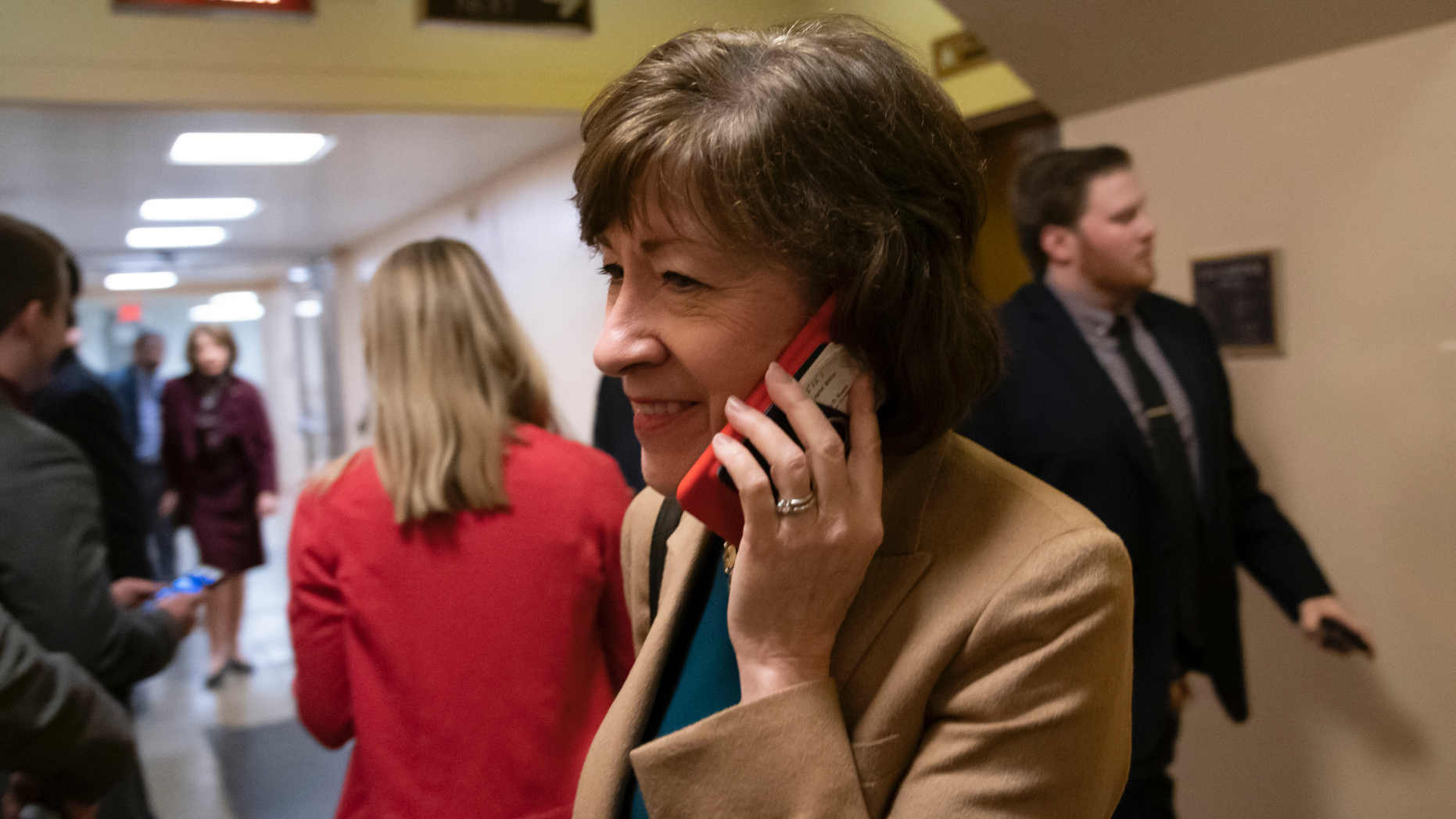 Sen. Susan Collins, R-Maine, arrives in the Senate where she has said she will vote for a resolution to annul President Donald Trump's declaration of a national emergency at the southwest border, on Capitol Hill in Washington, Thursday, March 14, 2019. (AP Photo/J. Scott Applewhite)