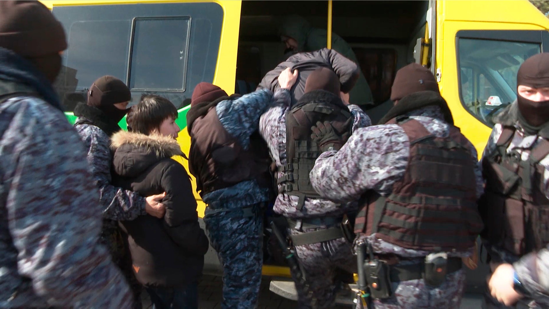 In this video grab from Radio Free Europe/Radio Liberty stream video, taken on Thursday, March 21, 2019, police officers detain a small group of people who were protesting against the renaming of the capital city, in central Astana, Kazakhstan. Kazakhstan has renamed its capital city Astana, now calling it Nursultan, to honour outgoing President Nursultan Nazarbayev, who unexpectedly resigned on Tuesday. (Serhii Nuzhnenko/Radio Free Europe/Radio Liberty via AP)