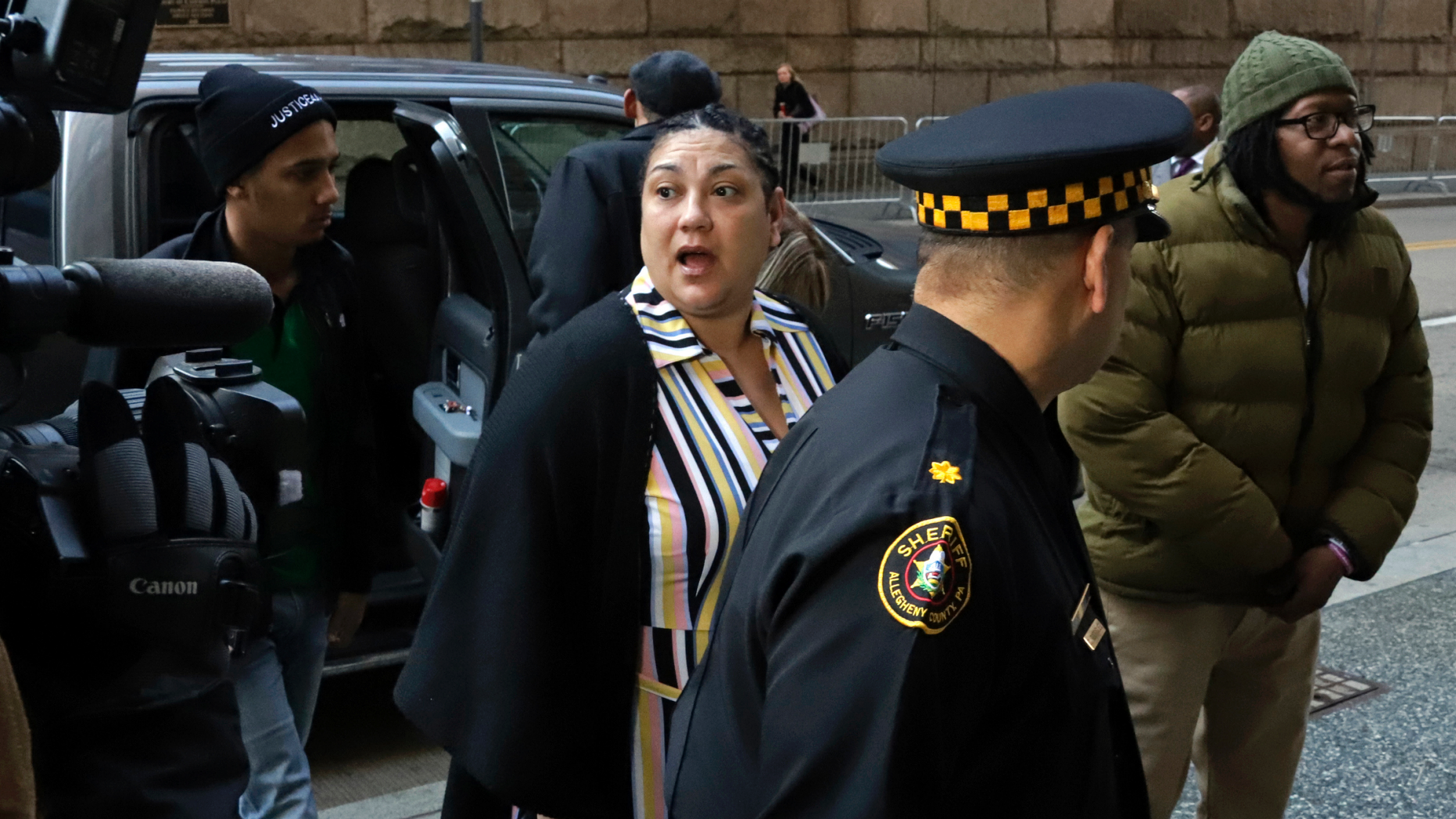 Michelle Kenney, center, mother of Antwon Rose II, arrives at Allegheny County Courthouse with supporters on the second day of the trial of Michael Rosfeld, former East Pittsburgh Police Officer ( Pennsylvania), Wednesday, March 20, 2019. Rosfeld is accused of homicide for the fatal killing of Antwon Rose II during the shootout during the traffic disruption on June 19, 2018. (Photo AP / Gene J. Puskar)