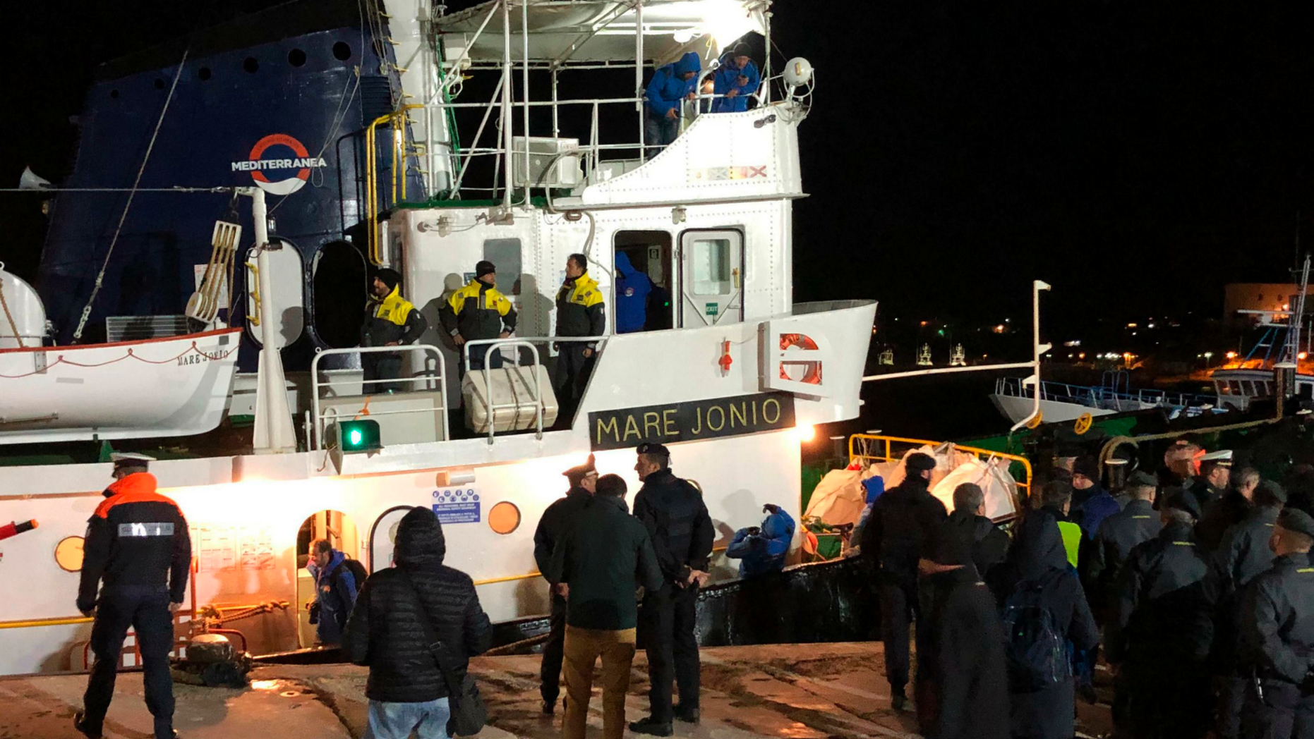 The Mare Jonio ship with 49 migrants on board docks at the port of Lampedusa island, Italy, Tuesday, March 19, 2019. Italy’s hard-line interior Matteo Salvini minister is again refusing to allow migrants rescued at sea by humanitarian groups to disembark in Italy. The mayor of Lampedusa is challenging Salvini's assertion that Italian ports are closed. The migrants, including 12 minors, were rescued Monday off the coast of Libya by the Italian humanitarian group Mediterranea Saving Humans. (Elio Desiderio/ANSA via AP)