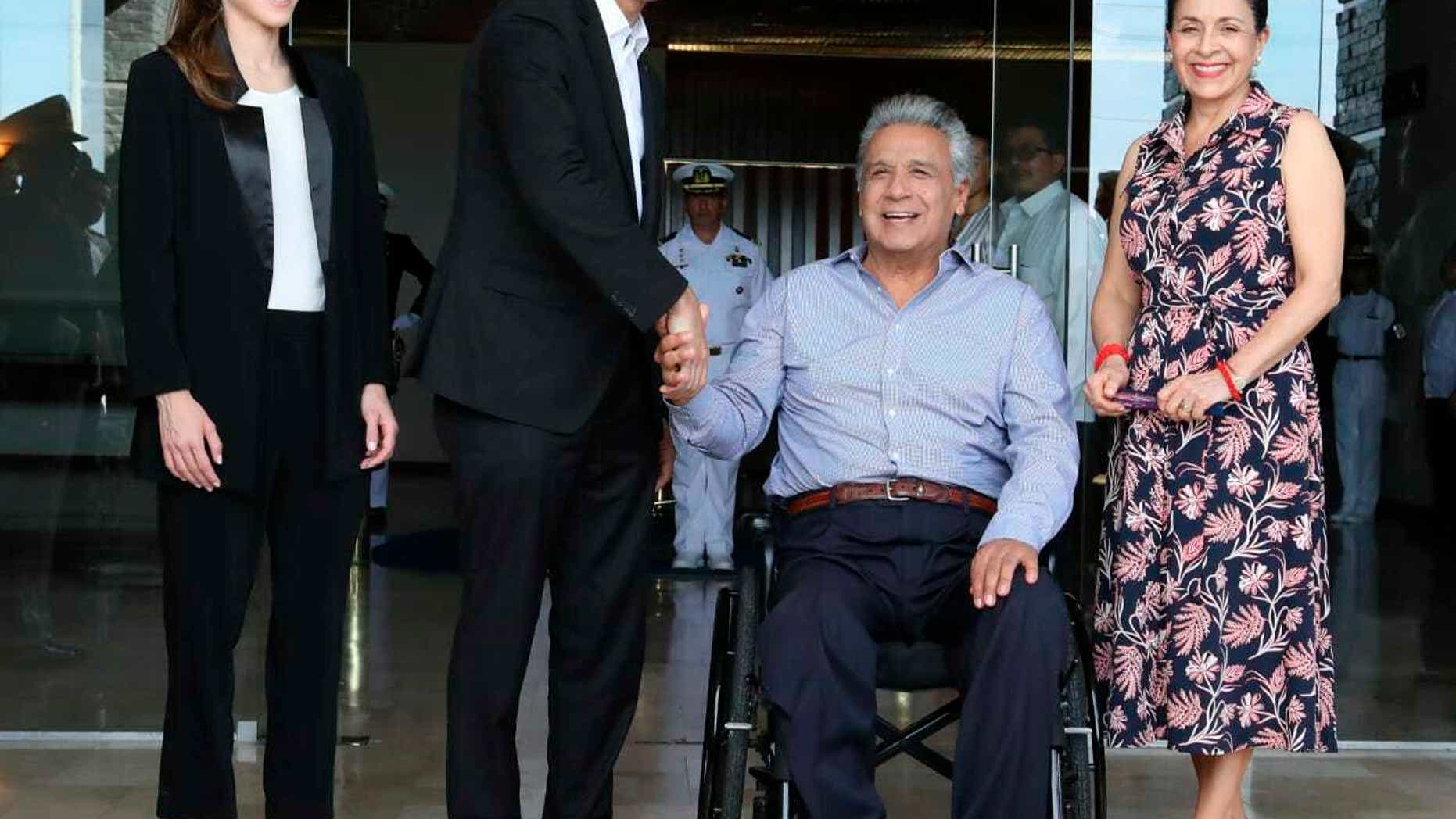 In this photo provided by Ecuador's Presidential Office, Ecuador's President Lenin Moreno, center right, and his wife Rocio Gonzalez, right, welcome Venezuela's self-declared interim president Juan Guaido, center left, and his wife Fabiana Rosales during a meeting in Salinas, Ecuador. Saturday, Feb. 2, 2019. Guaido is in tour of several South American capitals as part of a campaign to build international pressure on his rival Nicolas Maduro to quit. (AP Photo/Ecuador's Presidency)