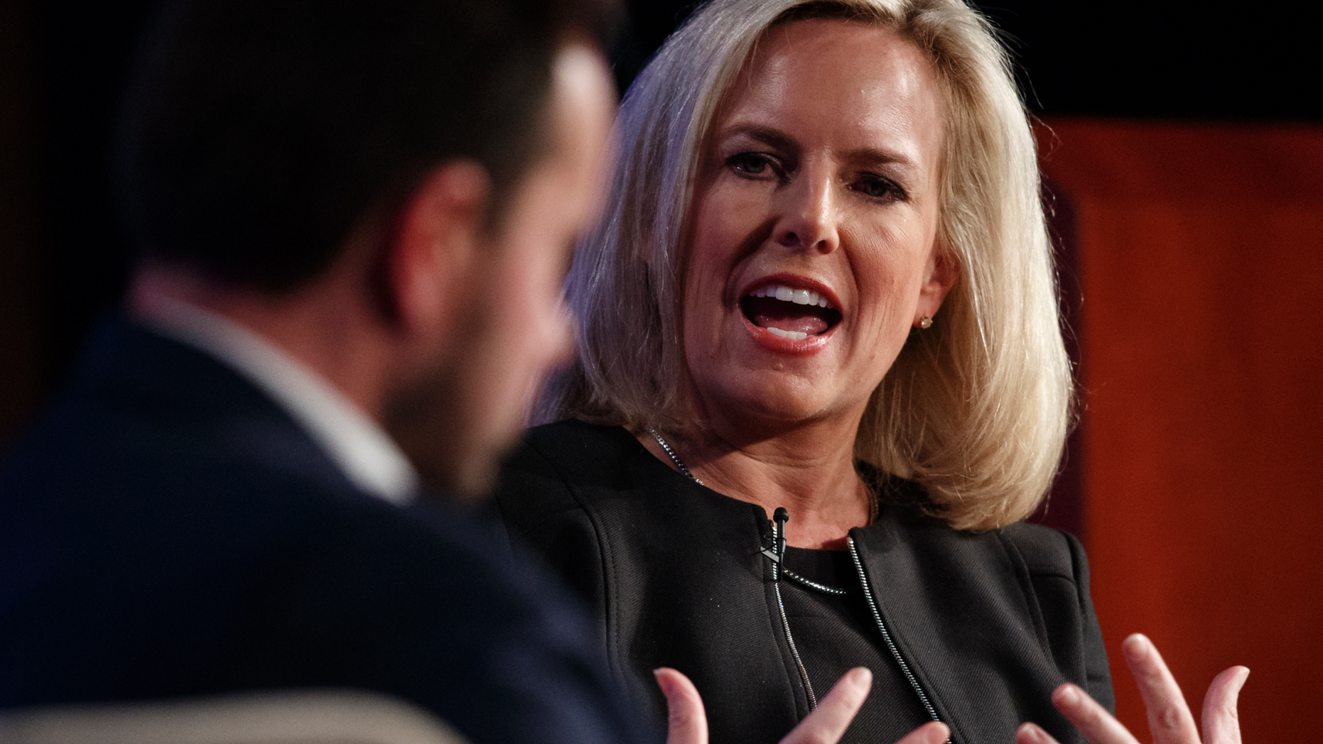 Homeland Security Secretary Kirstjen Nielsen, joined by director of Auburn University's McCrary Institute for Cyber and Critical Infrastructure Security, Frank Cilluffo, speaks at George Washington University's Jack Morton Auditorium in Washington, Monday, March 18, 2019 (AP Photo/Carolyn Kaster)