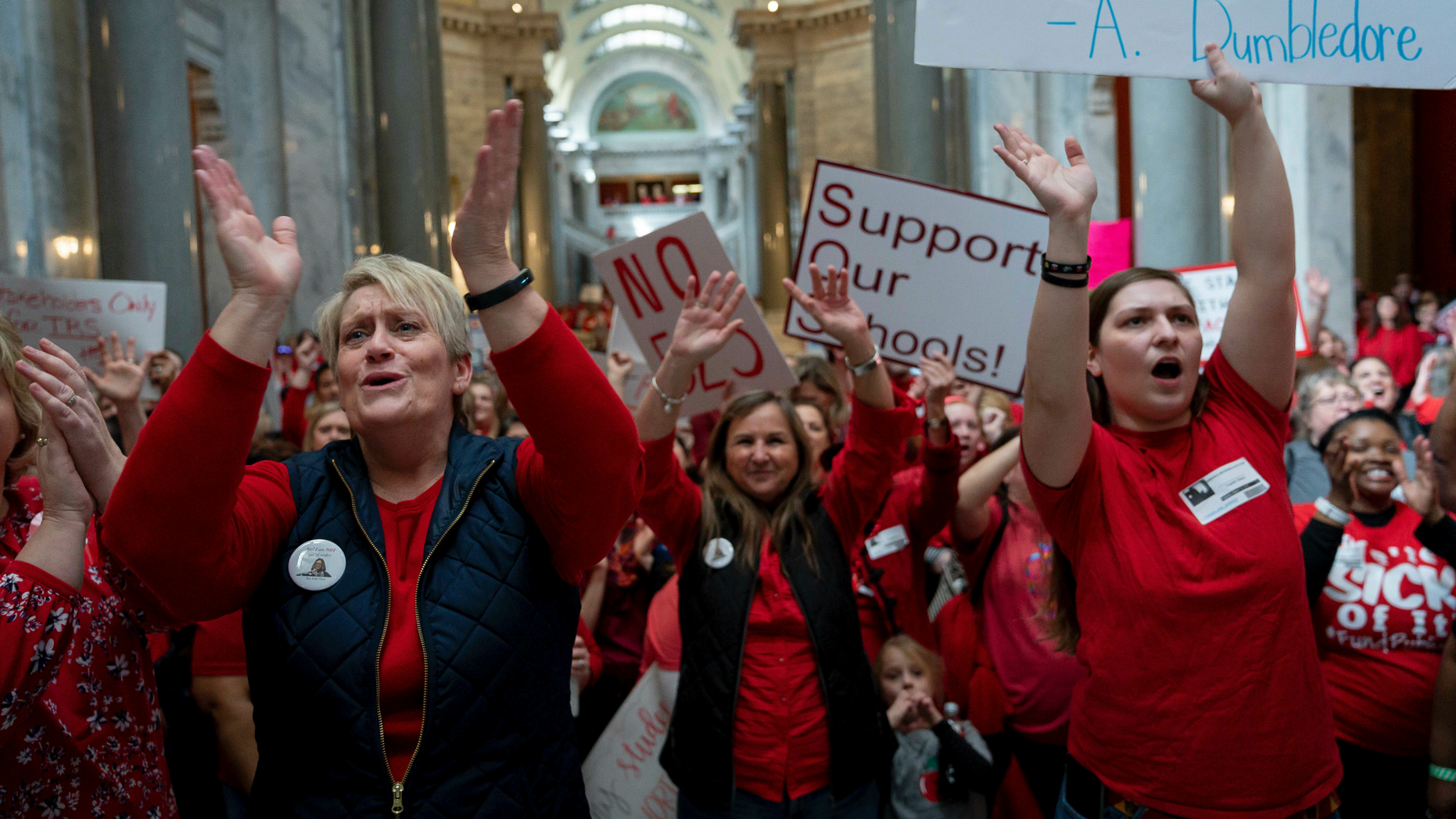 A group of several hundred teachers gathered to protest alleged attacks on public education at Capitol Hill, in Frankfort, Kentucky on Tuesday, March 12, 2019. (AP Photo / Bryan Woolston)